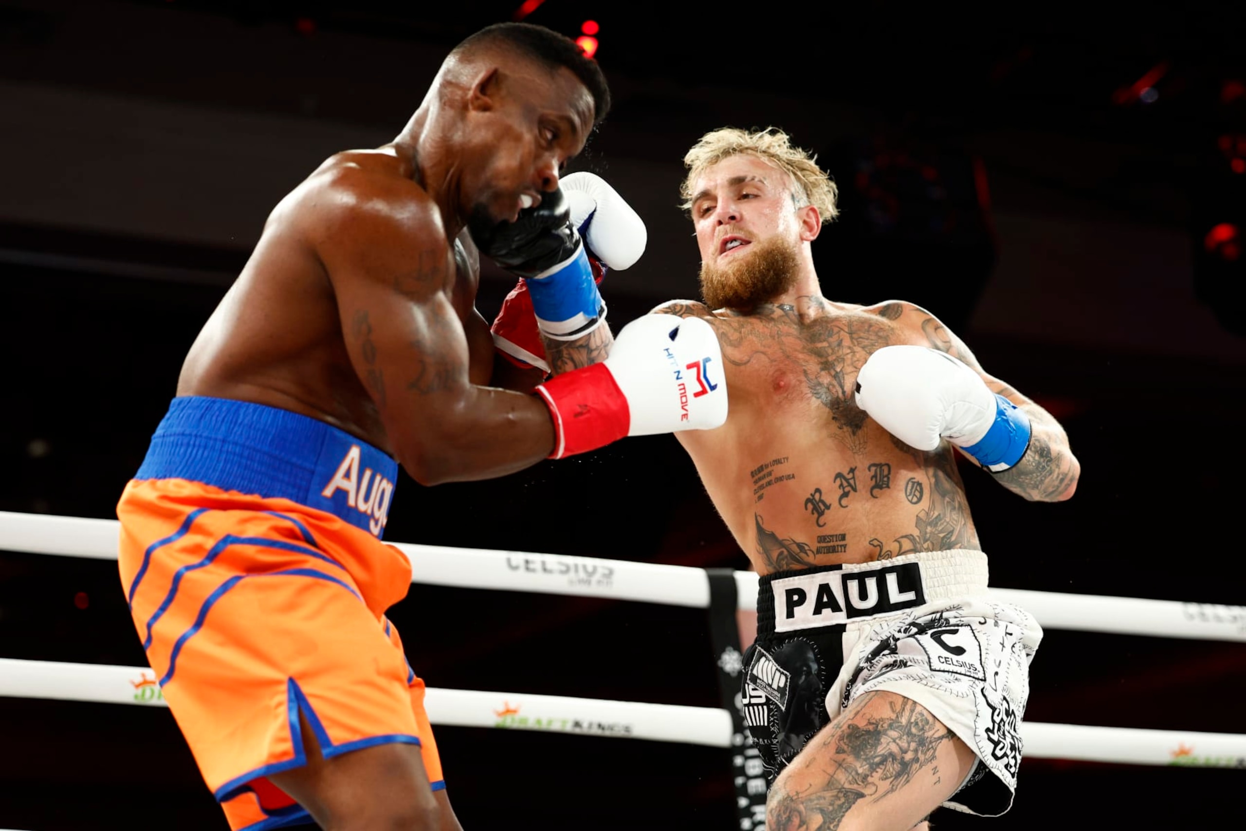 ORLANDO, FLORIDA - DECEMBER 15: Jake Paul punches Andre August during the Jake Paul v Andre August at Caribe Royale Orlando on December 15, 2023 in Orlando, Florida. (Photo by Douglas P. DeFelice/Getty Images for CELSIUS) ORLANDO, FLORIDA - DECEMBER 15: Jake Paul punches Andre August during the Jake Paul v Andre August at Caribe Royale Orlando on December 15, 2023 in Orlando, Florida. (Photo by Douglas P. DeFelice/Getty Images for CELSIUS)
