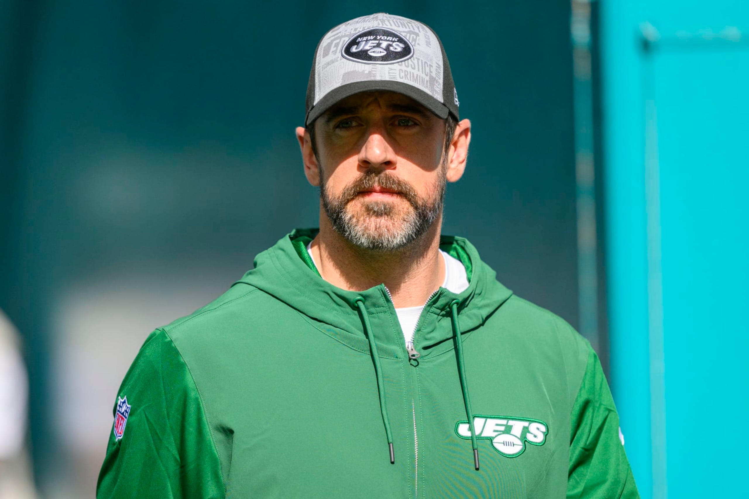 New York Jets quarterback Aaron Rodgers walks onto the field before an NFL football game against the Miami Dolphins, Sunday, Dec 17, 2023, in Miami Gardens, Fla. (AP Photo/Doug Murray) New York Jets quarterback Aaron Rodgers walks onto the field before an NFL football game against the Miami Dolphins, Sunday, Dec 17, 2023, in Miami Gardens, Fla. (AP Photo/Doug Murray)