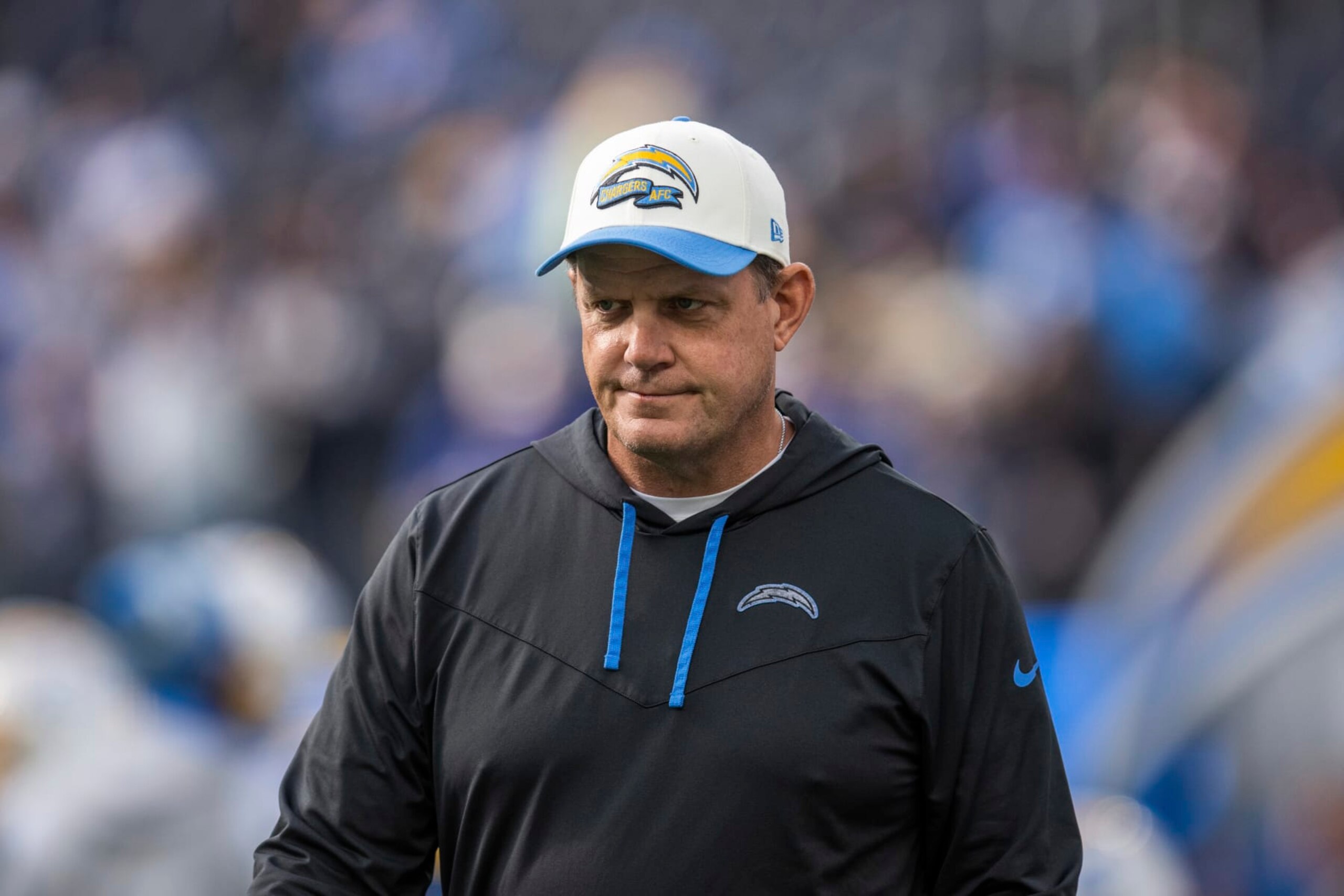 Los Angeles Chargers outside linebackers coach Giff Smith walks on the field before an NFL football game against the Los Angeles Rams, Sunday, Jan. 1, 2023, in Inglewood, Calif. (AP Photo/Kyusung Gong) Los Angeles Chargers outside linebackers coach Giff Smith walks on the field before an NFL football game against the Los Angeles Rams, Sunday, Jan. 1, 2023, in Inglewood, Calif. (AP Photo/Kyusung Gong)