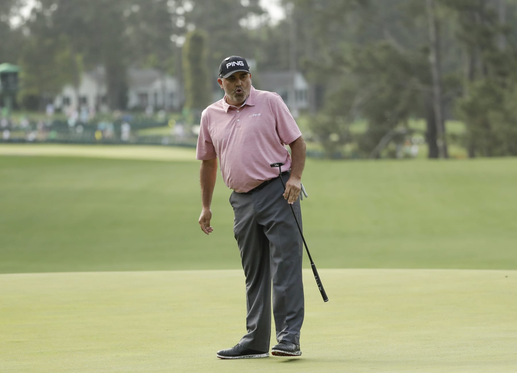 Angel Cabrera, of Argentina, reacts to his putt on the first hole during the first round for the Masters golf tournament Thursday, April 11, 2019, in Augusta, Ga. (AP Photo/Marcio Jose Sanchez)