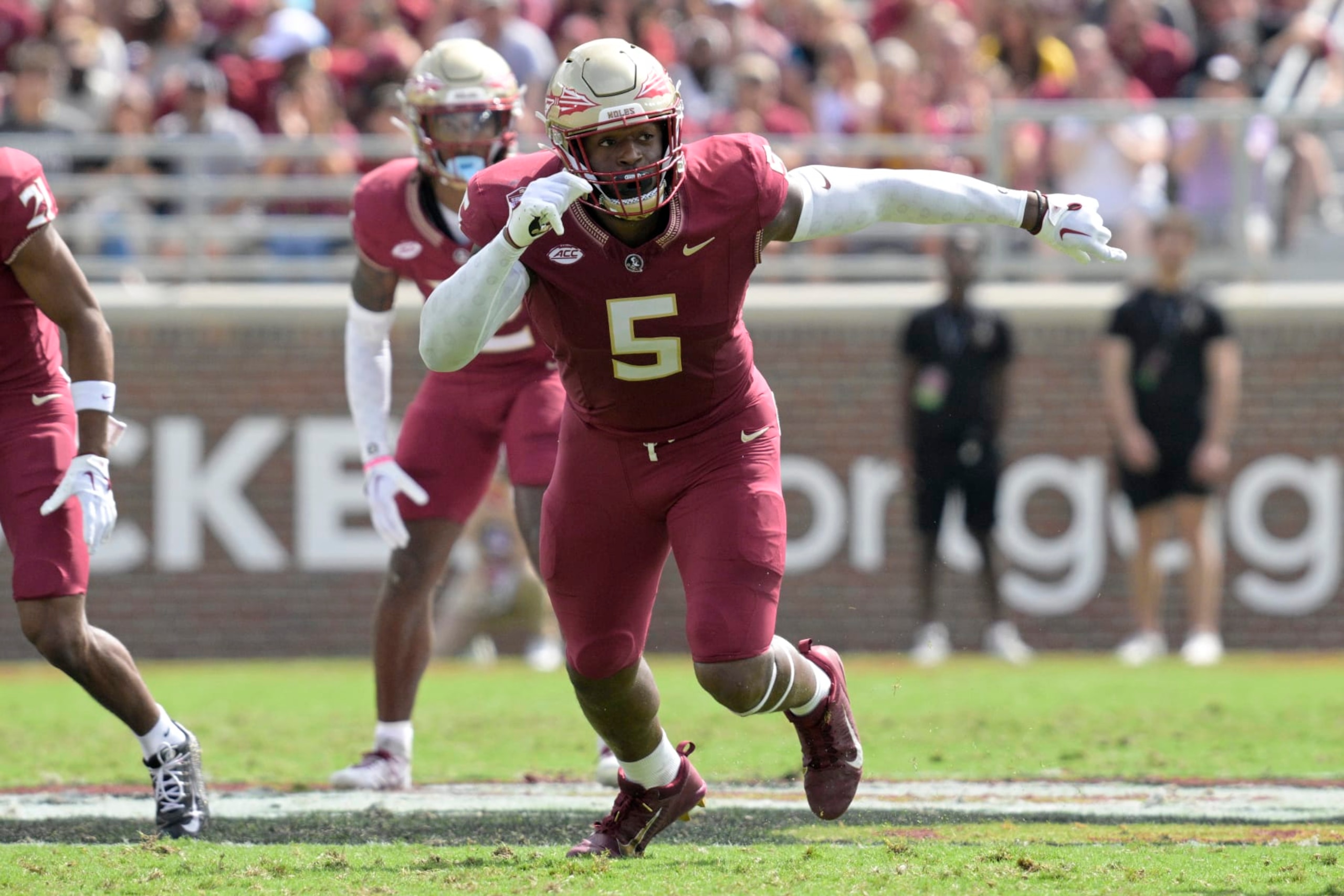 Florida State defensive lineman Jared Verse (5) follows a play against Syracuse during the first half of an NCAA college football game, Saturday, Oct. 14, 2023, in Tallahassee, Fla. (AP Photo/Phelan M. Ebenhack)