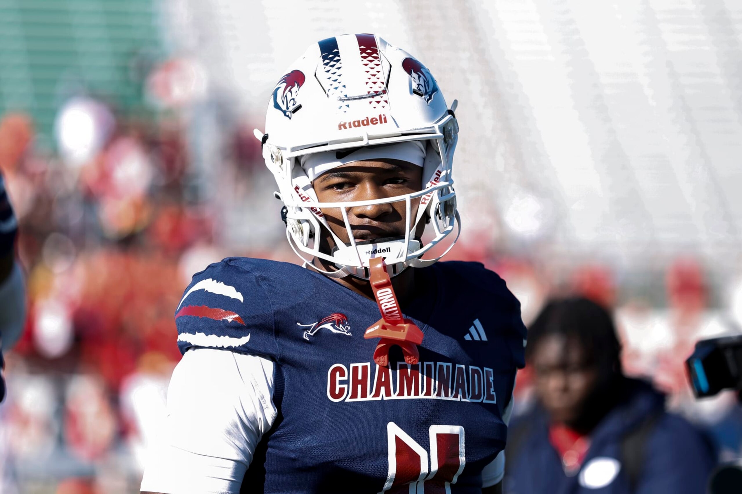 TALLAHASSEE, FLORIDA - DECEMBER 07: Wide Receiver Jeremiah Smith #4 of the Chaminade-Madonna Lions on the sidelines during the FHSAA Class1M Football State Championship game against the Clearwater Central Catholic Marauders at Bragg Memorial Stadium on Ken Riley Field on the campus of Florida A&M University on December 7, 2023 in Tallahassee, Florida. Smith is a 5-star Wide Receiver recruit and the #1 collegiate prospect in the nation. He has committed to the Ohio State Buckeyes. The Lions defeated the Marauders 56 to 0. (Photo by Don Juan Moore/Getty Images)