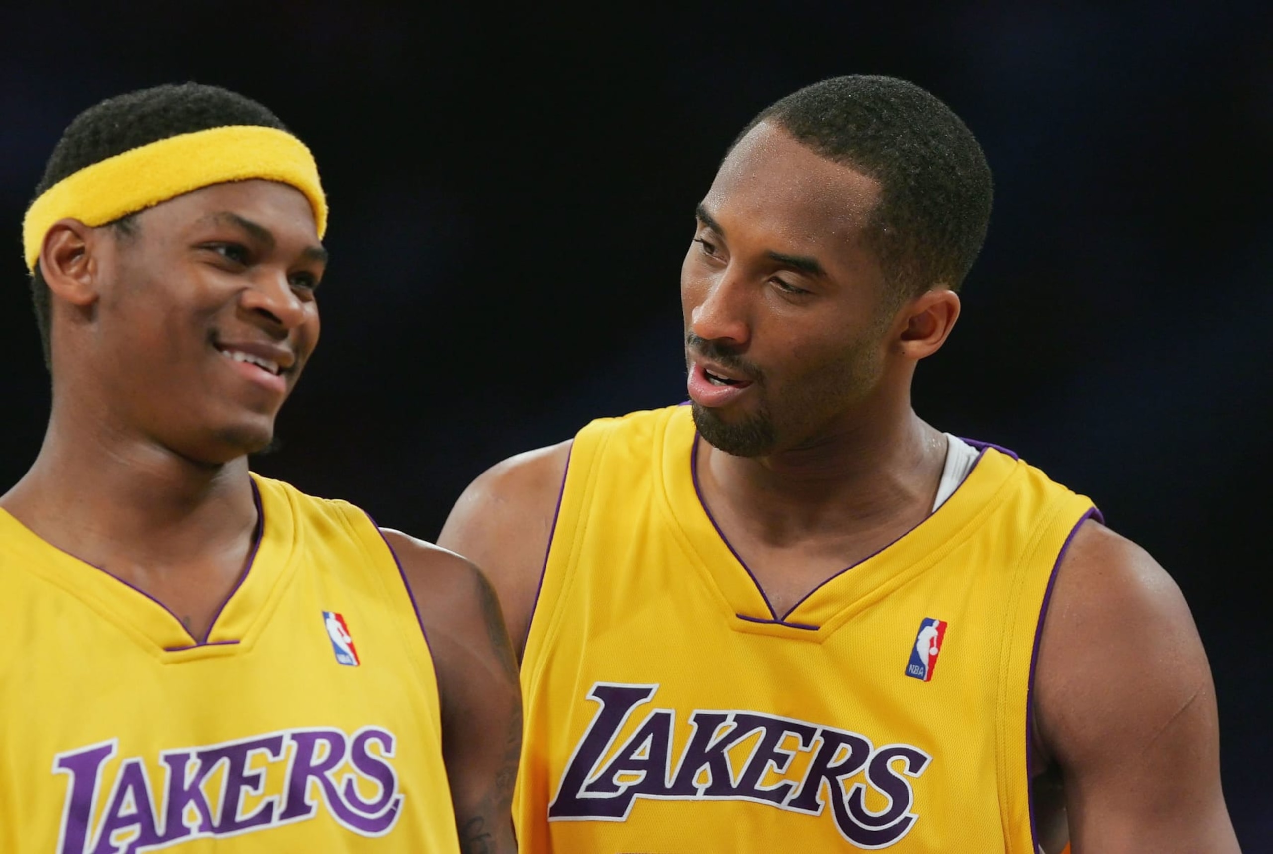 LOS ANGELES, CA - FEBRUARY 13:  Kobe Bryant #24 talks with his teammate Smush Parker #1 of the Los Angeles Lakers during the game against the New York Knicks on February 13, 2007 at Staples Center in Los Angeles, California. NOTE TO USER: User expressly acknowledges and agrees that, by downloading and/or using this Photograph, user is consenting to the terms and conditions of the Getty Images License Agreement. Mandatory Copyright Notice: Copyright 2007 NBAE.  (Photo by Lisa Blumenfeld/Getty Images)