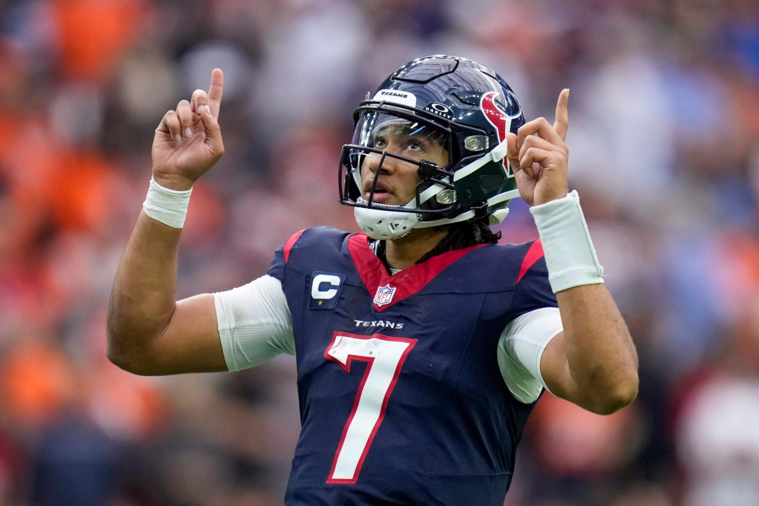 Houston Texans quarterback C.J. Stroud (7) reacts to a play against the Denver Broncos during the first half of an NFL football game Sunday, Dec. 3, 2023, in Houston. (AP Photo/Eric Christian Smith)
