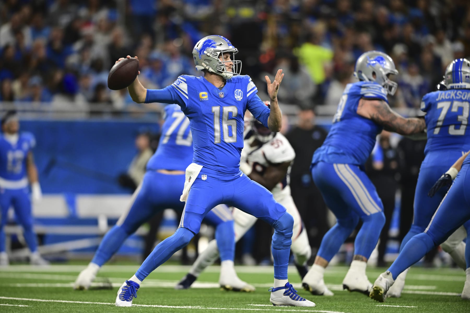 Detroit Lions quarterback Jared Goff throws during the first half of an NFL football game against the Denver Broncos, Saturday, Dec. 16, 2023, in Detroit. (AP Photo/David Dermer)
