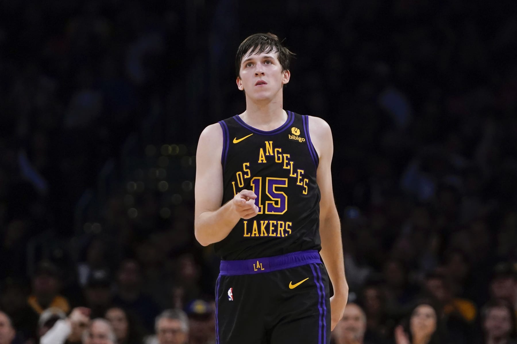 Los Angeles Lakers guard Austin Reaves gestures after drawing an and-1 foul during the second half of an NBA basketball game against the New York Knicks, Monday, Dec. 18, 2023, in Los Angeles. (AP Photo/Ryan Sun)