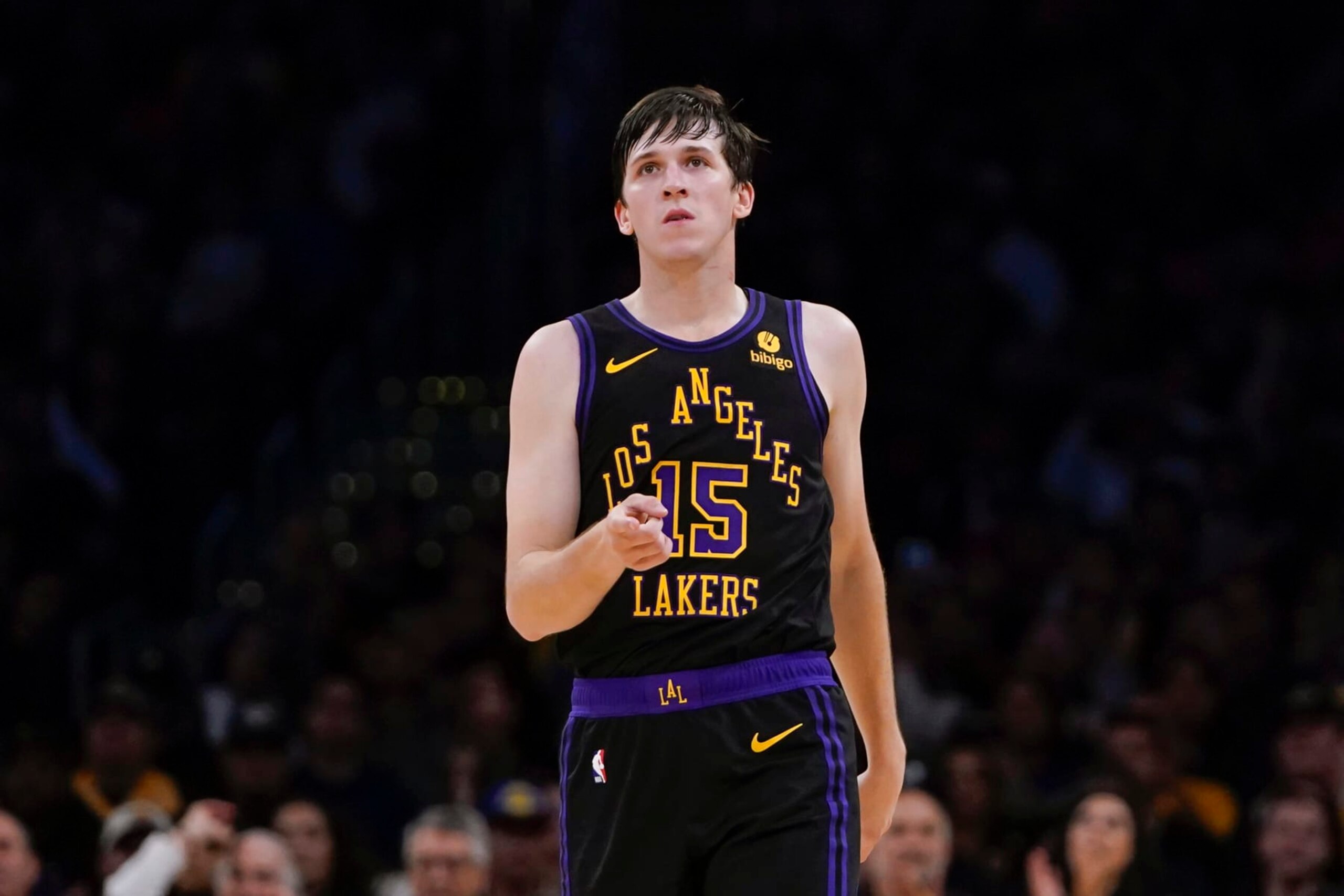 Los Angeles Lakers guard Austin Reaves gestures after drawing an and-1 foul during the second half of an NBA basketball game against the New York Knicks, Monday, Dec. 18, 2023, in Los Angeles. (AP Photo/Ryan Sun)