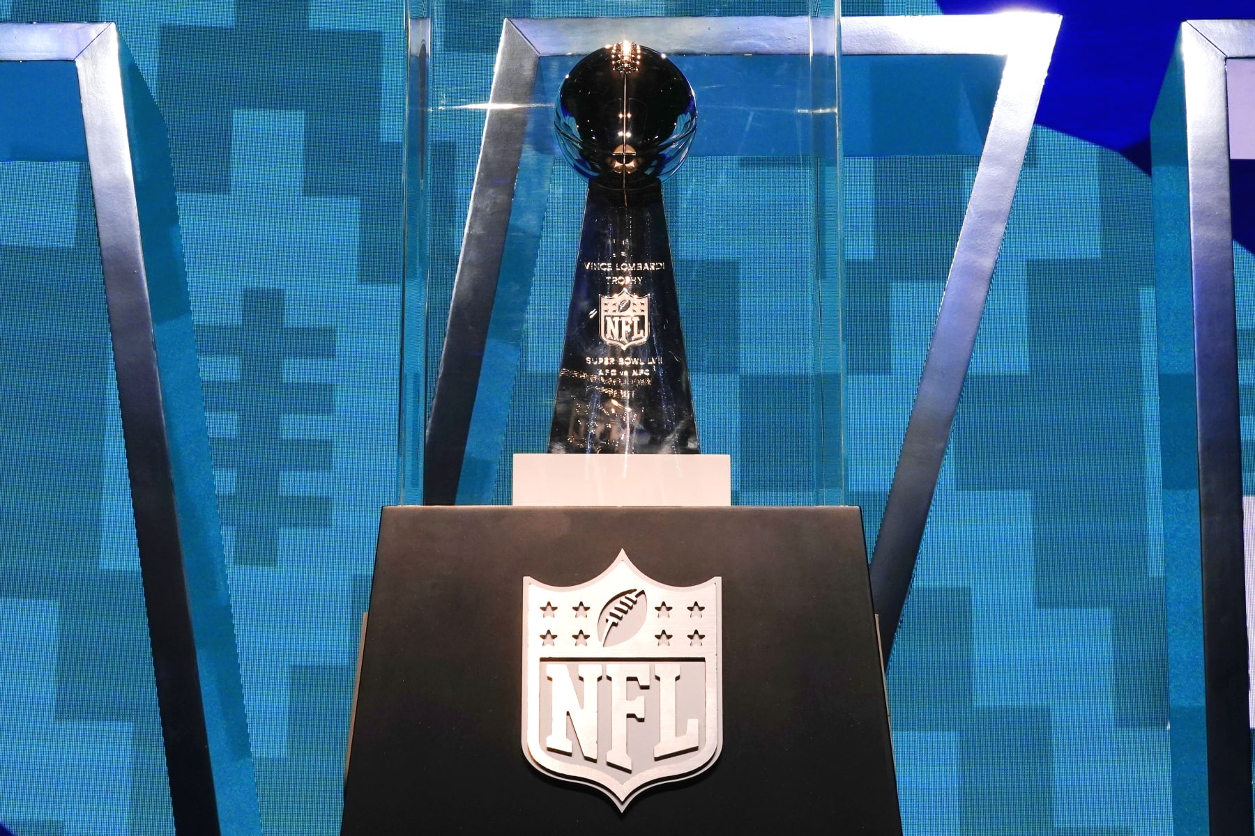 The Vince Lombardi Trophy stands on display at the Super Bowl Experience, open to fans for the first day, leading up to the NFL Super Bowl LVII football game in Phoenix, Saturday, Feb. 4, 2023. (AP Photo/Ross D. Franklin)