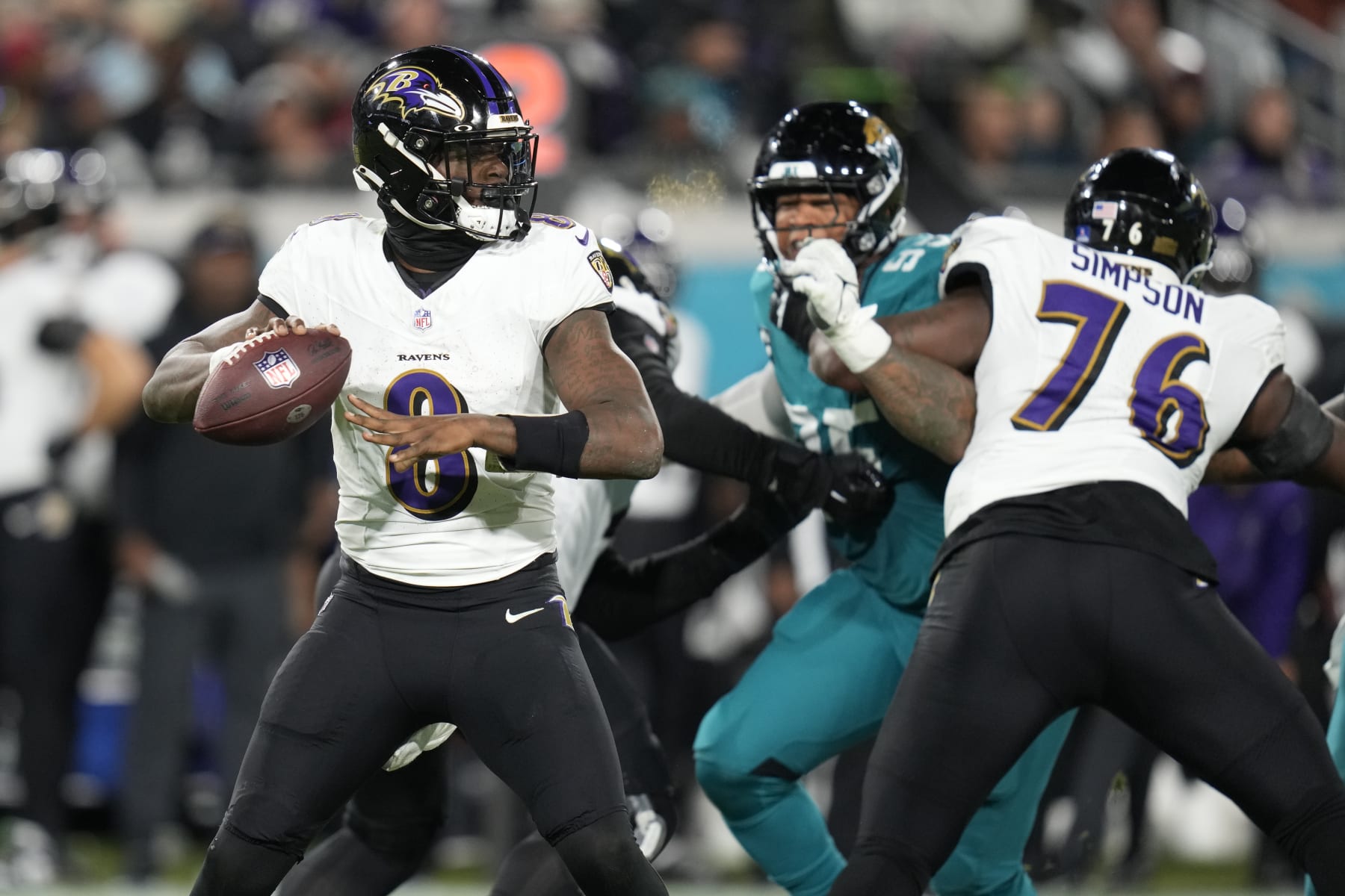Baltimore Ravens quarterback Lamar Jackson (8) passes against the Jacksonville Jaguars in the second half of an NFL football game Sunday, Dec. 17, 2023, in Jacksonville, Fla. (AP Photo/John Raoux)