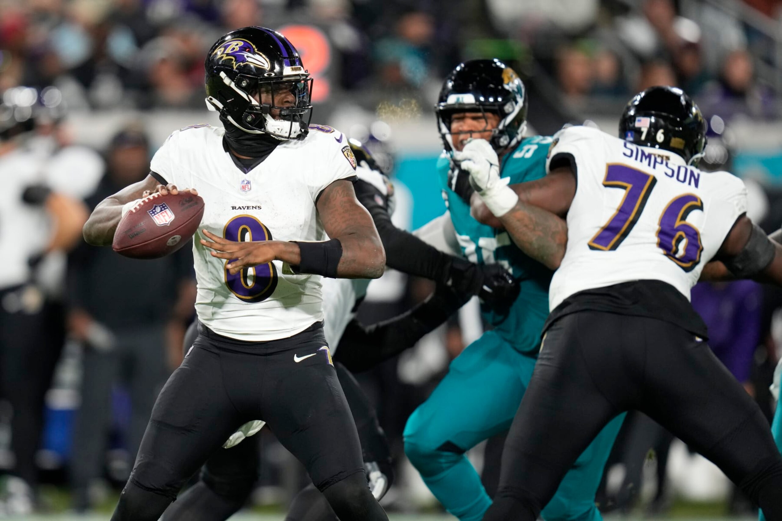 Baltimore Ravens quarterback Lamar Jackson (8) passes against the Jacksonville Jaguars in the second half of an NFL football game Sunday, Dec. 17, 2023, in Jacksonville, Fla. (AP Photo/John Raoux)