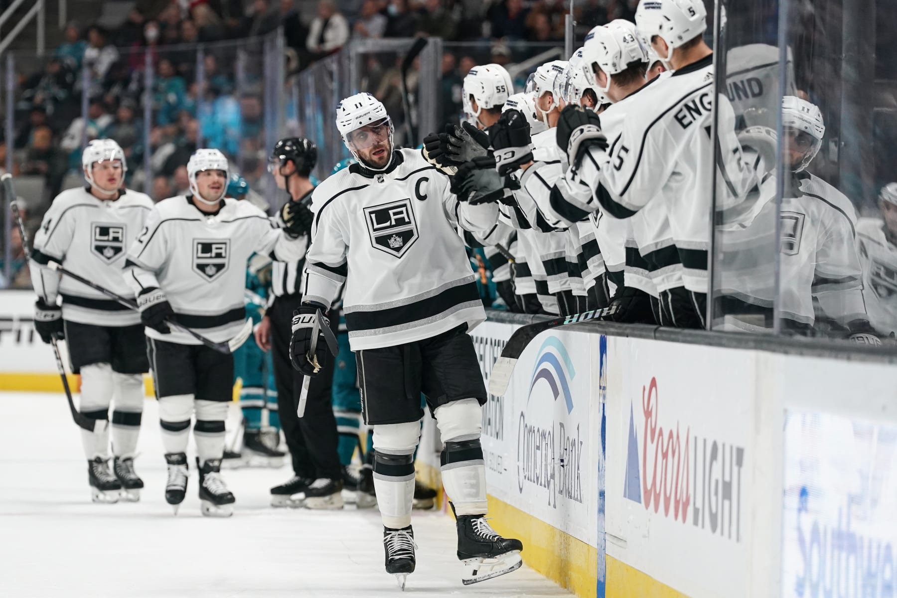SAN JOSE, CA - DECEMBER 19: Anze Kopitar #11 of the Los Angeles Kings celebrates scoring a goal against the San Jose Sharks at SAP Center on December 19, 2023 in San Jose, California. (Photo by Kavin Mistry/NHLI via Getty Images)
