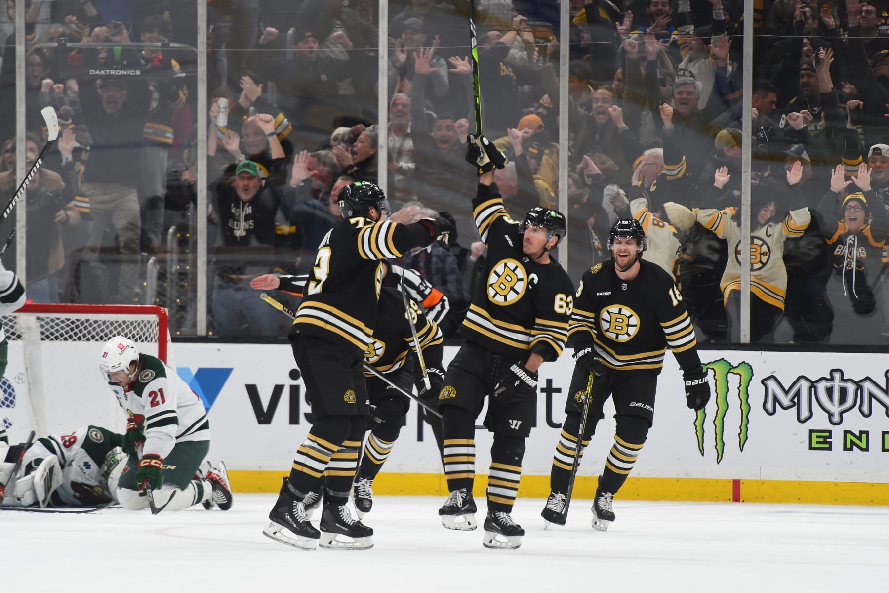 BOSTON, MASSACHUSETTS - DECEMBER 19: Brad Marchand #63 of the Boston Bruins scores in the third period to tie the game against the Minnesota Wild on December 19, 2023 at the TD Garden in Boston, Massachusetts. (Photo by Steve Babineau/NHLI via Getty Images)