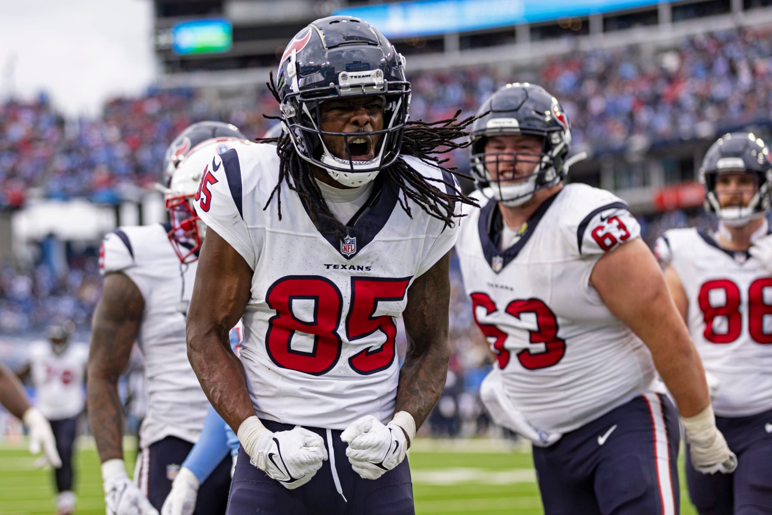 Houston Texans wide receiver Noah Brown (85) celebrates after scoring a touchdown during their NFL football game against the Tennessee Titans Sunday, Dec. 17, 2023, in Nashville, Tenn. (AP Photo/Wade Payne)