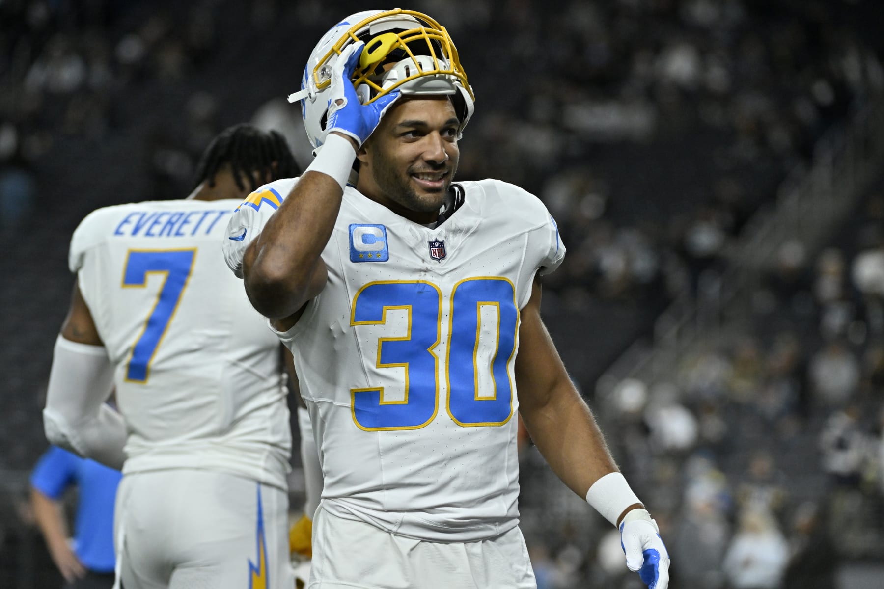Los Angeles Chargers running back Austin Ekeler (30) warms up before an NFL football game against the Las Vegas Raiders, Thursday, Dec. 14, 2023, in Las Vegas. (AP Photo/David Becker)