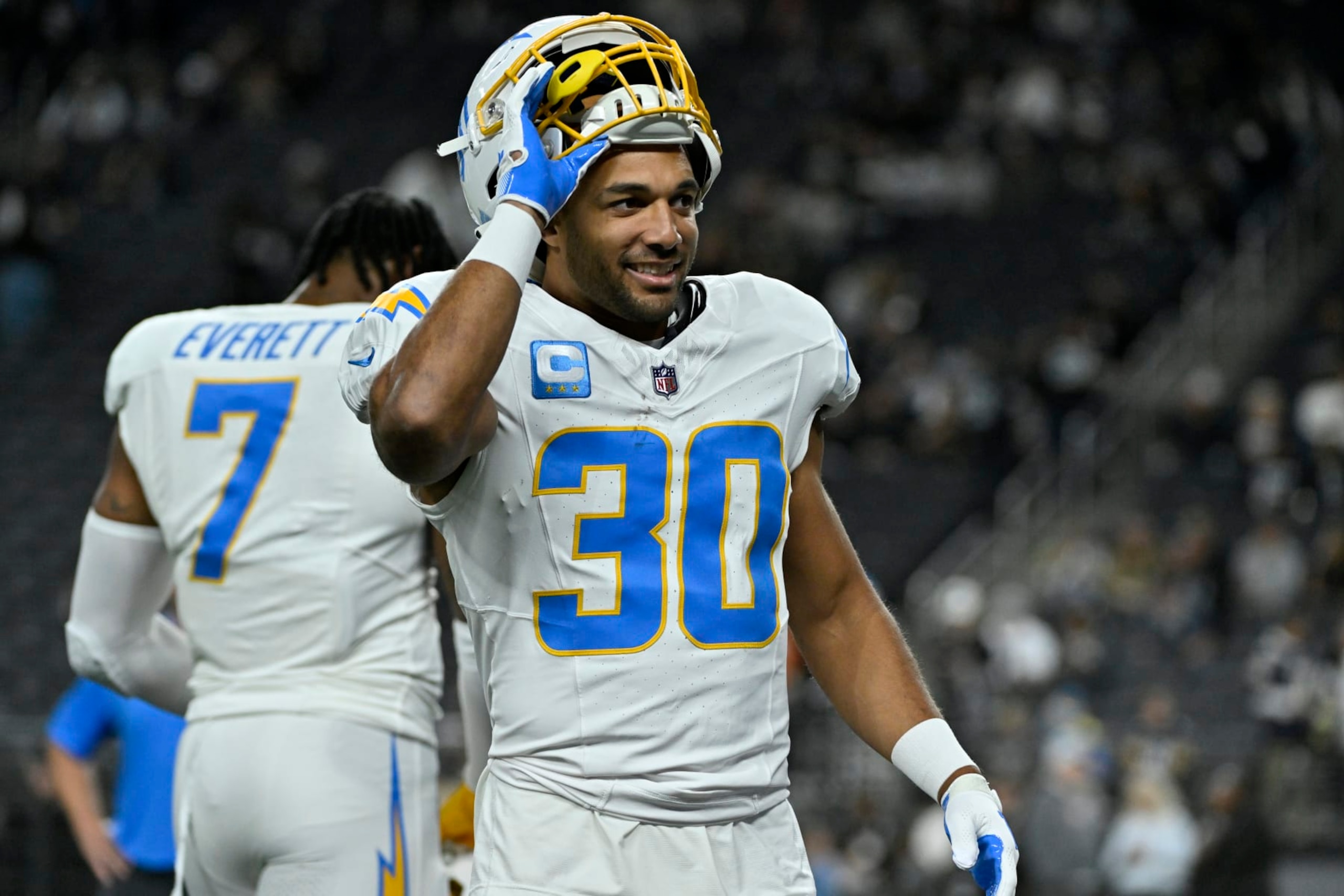 Los Angeles Chargers running back Austin Ekeler (30) warms up before an NFL football game against the Las Vegas Raiders, Thursday, Dec. 14, 2023, in Las Vegas. (AP Photo/David Becker) Los Angeles Chargers running back Austin Ekeler (30) warms up before an NFL football game against the Las Vegas Raiders, Thursday, Dec. 14, 2023, in Las Vegas. (AP Photo/David Becker)
