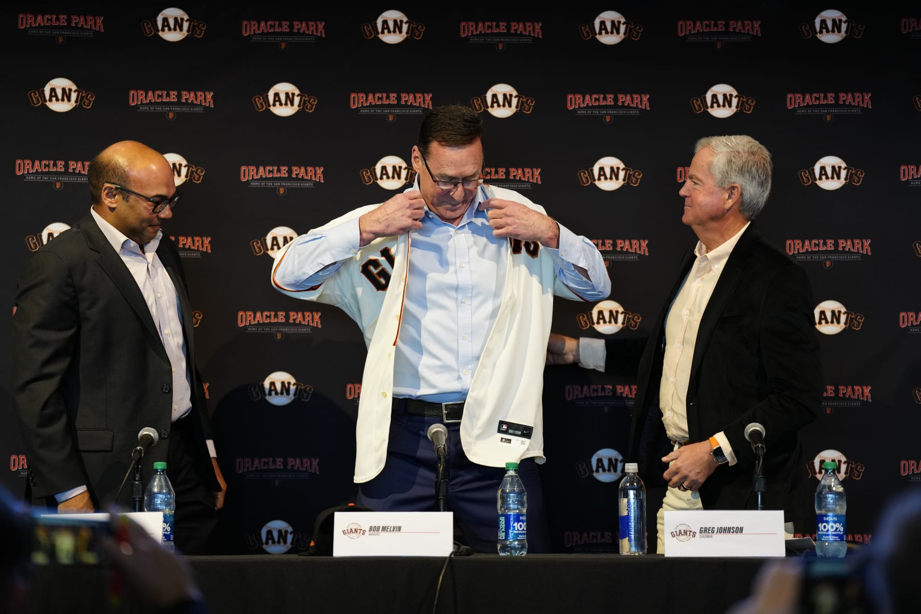 Farhan Zaidi (L), Bob Melvin (C) and Greg Johnson (R)