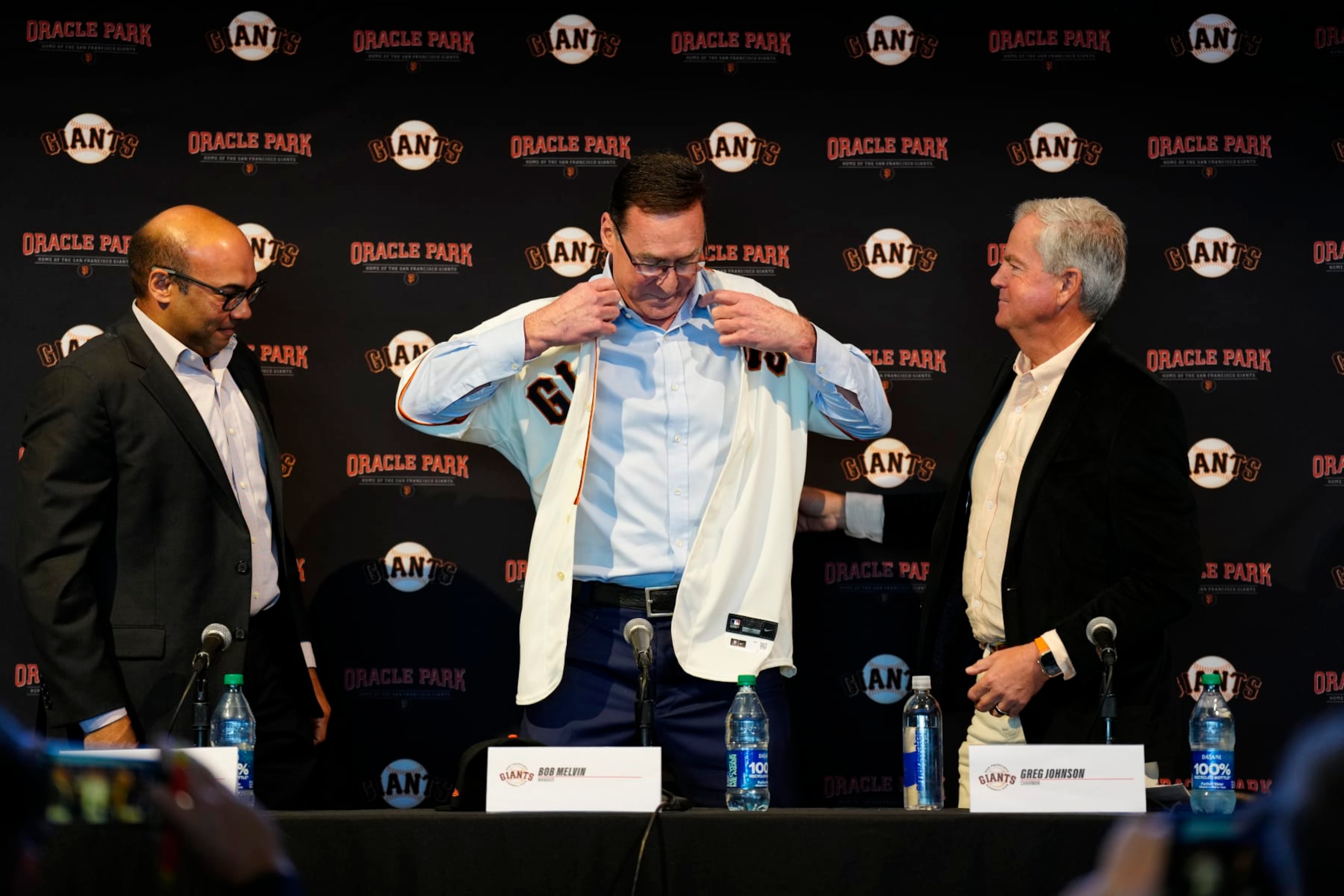 Farhan Zaidi (L), Bob Melvin (C) and Greg Johnson (R)