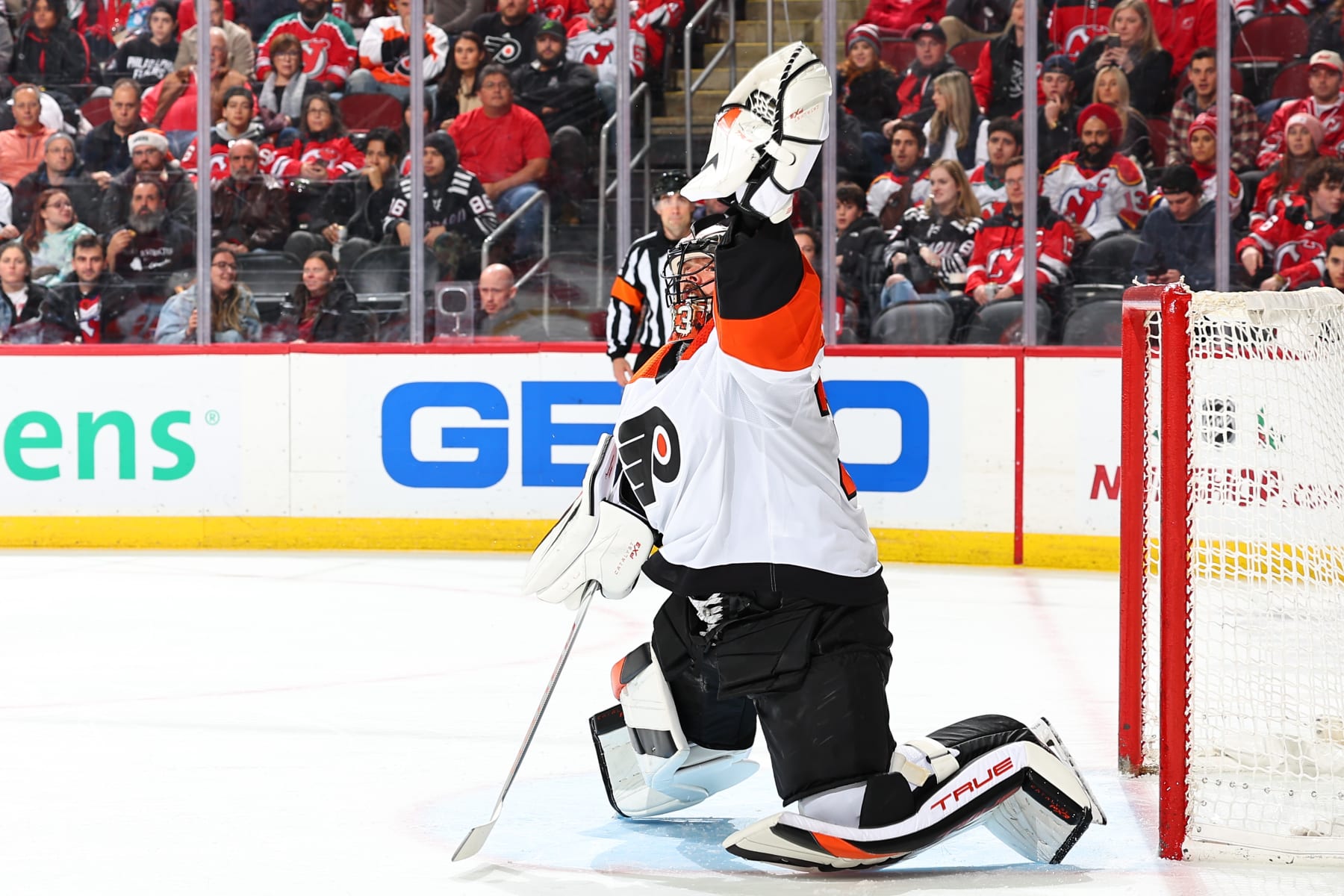 NEWARK, NJ - DECEMBER 19: Samuel Ersson #33 of the Philadelphia Flyers defends his net in the first period of the game against the New Jersey Devils at the Prudential Center on December 19, 2023 in Newark, New Jersey.  (Photo by Rich Graessle/NHLI via Getty Images)