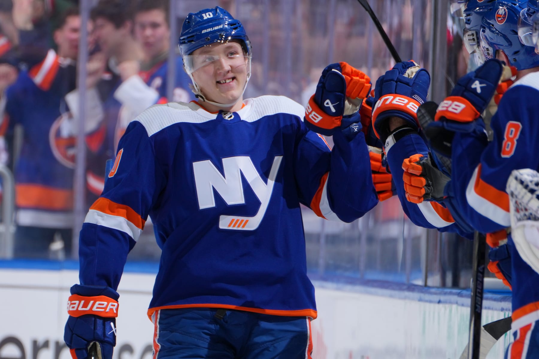 ELMONT, NEW YORK - DECEMBER 19: Simon Holmstrom #10 of the New York Islanders scores third goal in second period against the Edmonton Oilers at UBS Arena on December 19, 2023 in Elmont, New York. (Photo by Mike Stobe/NHLI via Getty Images)