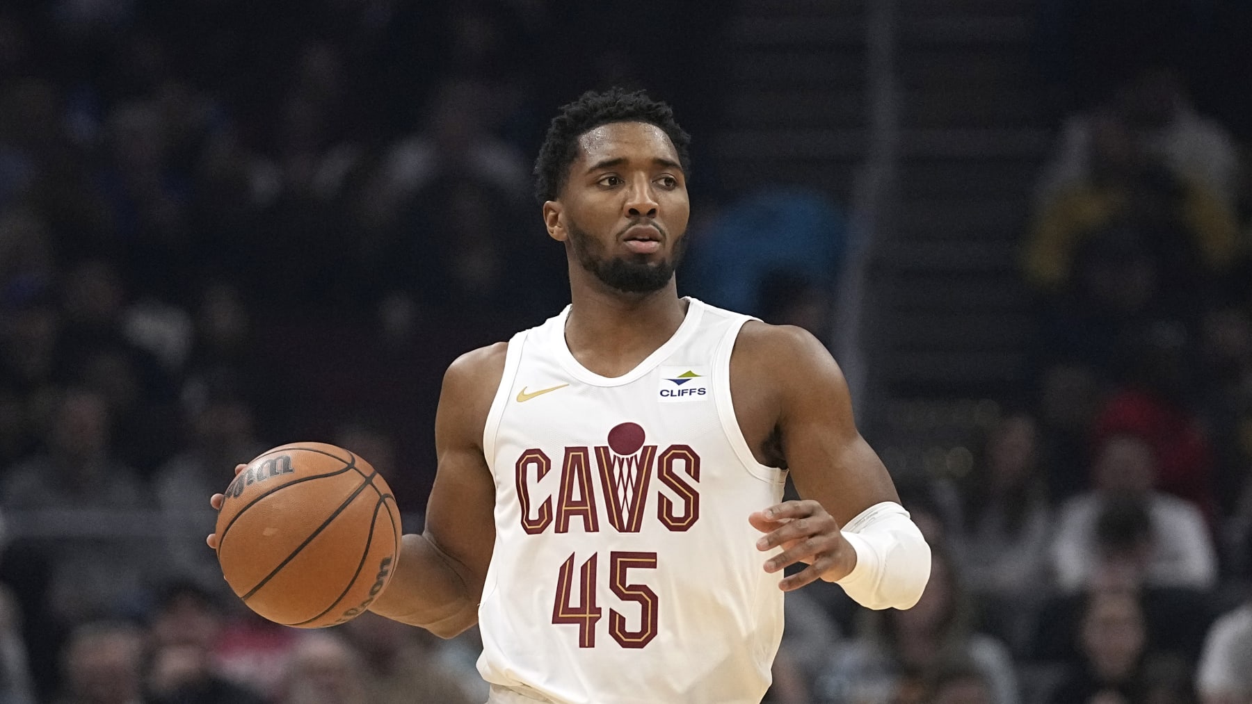 Cleveland Cavaliers guard Donovan Mitchell (45) during an NBA basketball game against the Houston Rockets, Monday, Dec. 18, 2023, in Cleveland. (AP Photo/Sue Ogrocki)