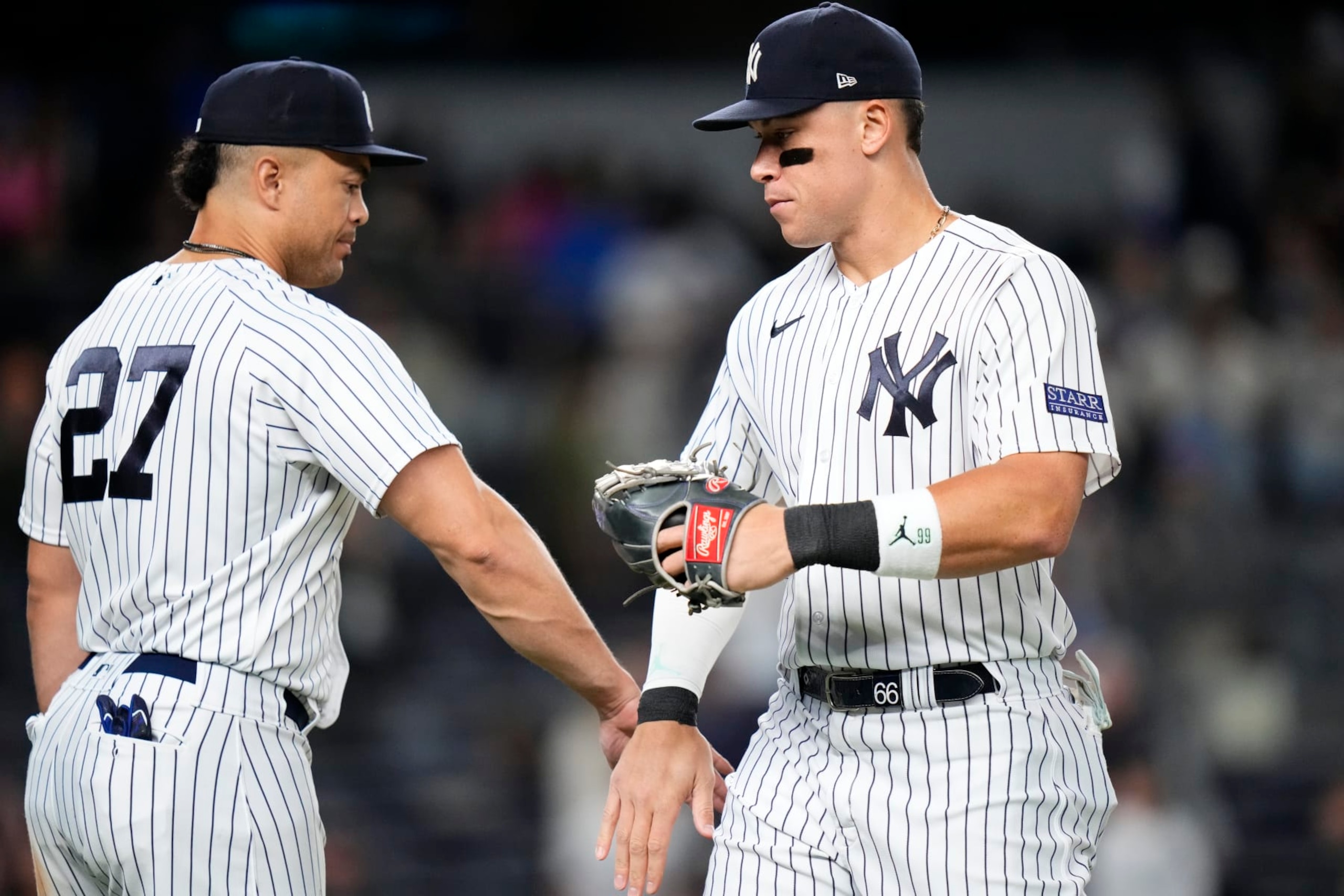 Giancarlo Stanton (L) and Aaron Judge (R)