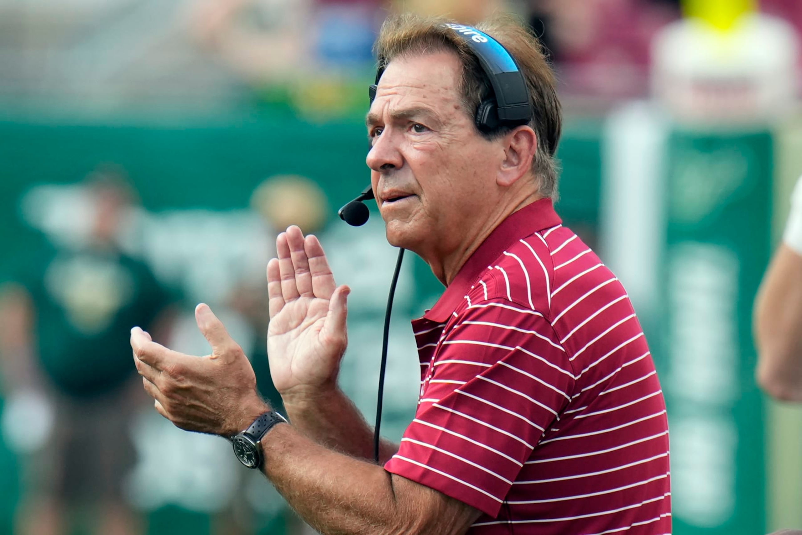 Alabama head coach Nick Saban claps during the first half of an NCAA college football game against South Florida Saturday, Sept. 16, 2023, in Tampa, Fla. (AP Photo/Chris O'Meara)