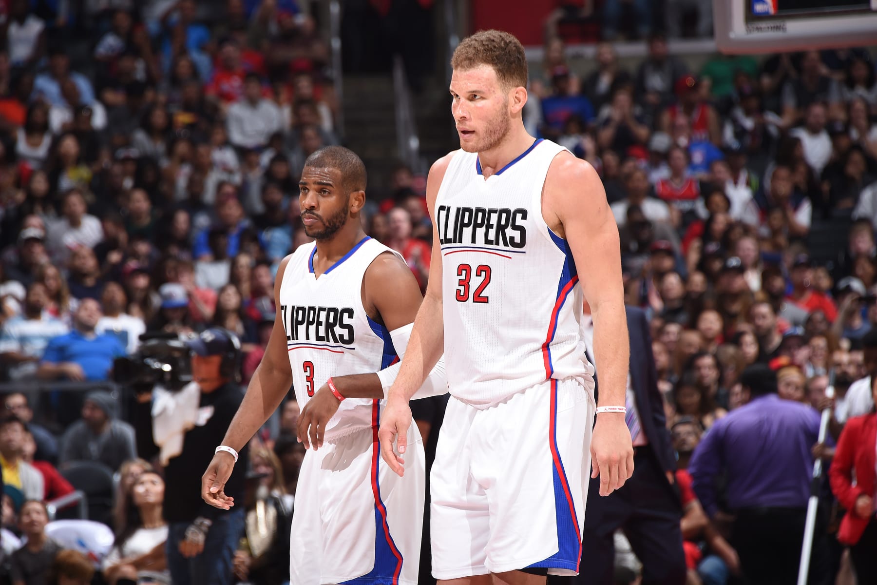 LOS ANGELES, CA - APRIL 3:  Blake Griffin #32 of the Los Angeles Clippers talks with Chris Paul #3 of the Los Angeles Clippers during the game against the Washington Wizards on April 3, 2016 at STAPLES Center in Los Angeles, California. NOTE TO USER: User expressly acknowledges and agrees that, by downloading and/or using this Photograph, user is consenting to the terms and conditions of the Getty Images License Agreement. Mandatory Copyright Notice: Copyright 2016 NBAE (Photo by Andrew D. Bernstein/NBAE via Getty Images)