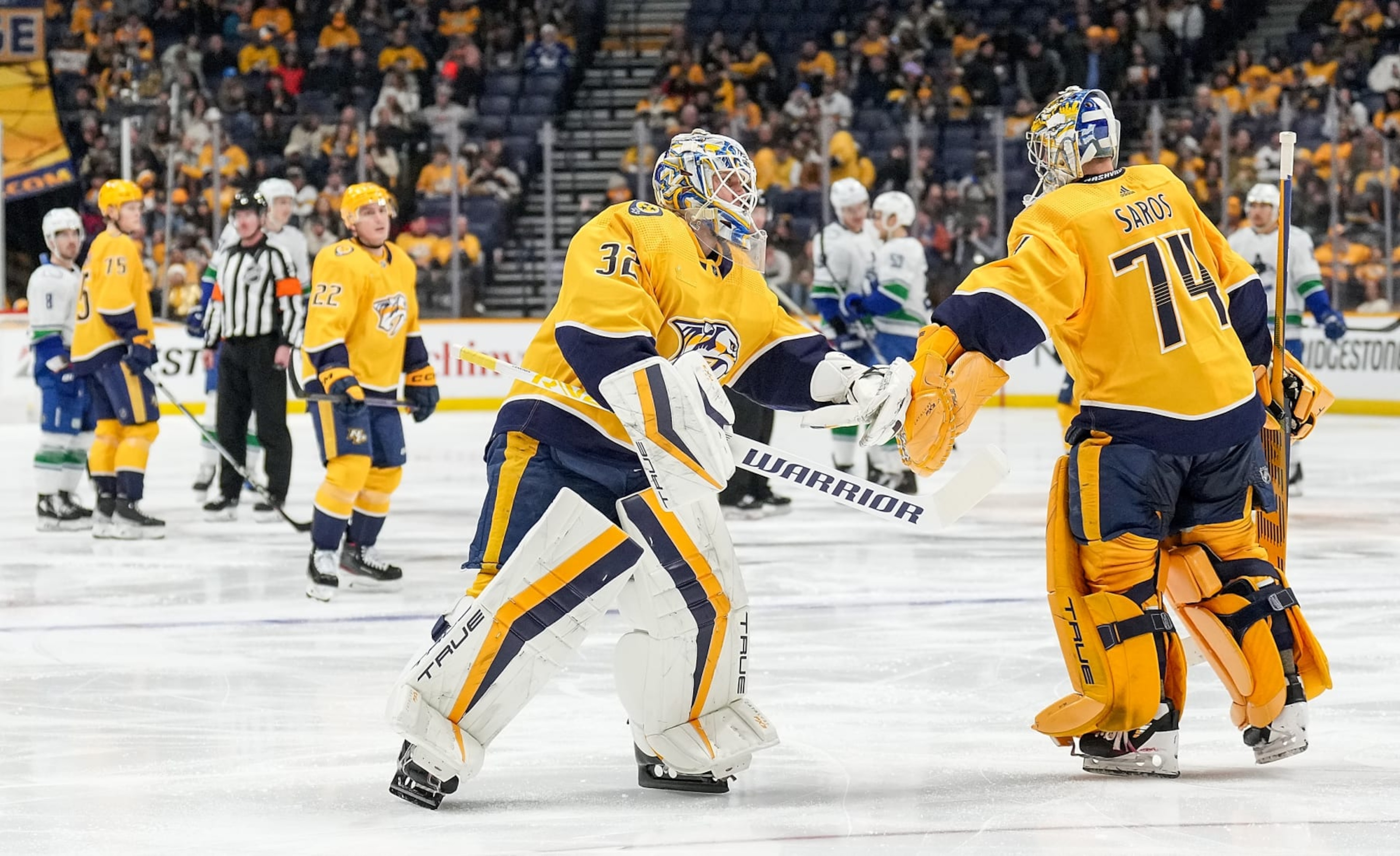 NASHVILLE, TENNESSEE - DECEMBER 19: Kevin Lankinen #32 replaces Juuse Saros #74 of the Nashville Predators in goal against the Vancouver Canucks during an NHL game at Bridgestone Arena on December 19, 2023 in Nashville, Tennessee. (Photo by John Russell/NHLI via Getty Images) NASHVILLE, TENNESSEE - DECEMBER 19: Kevin Lankinen #32 replaces Juuse Saros #74 of the Nashville Predators in goal against the Vancouver Canucks during an NHL game at Bridgestone Arena on December 19, 2023 in Nashville, Tennessee. (Photo by John Russell/NHLI via Getty Images)