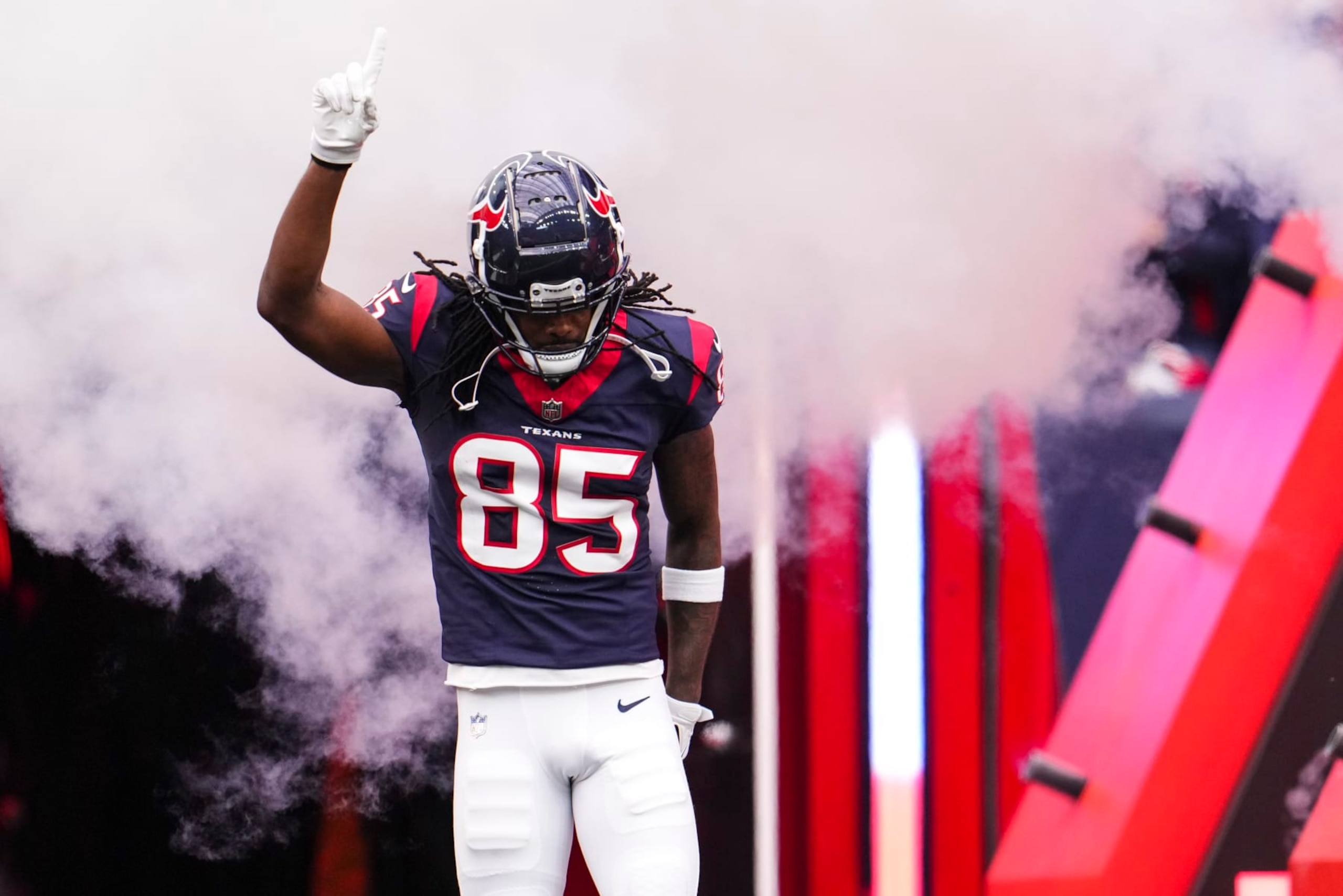 HOUSTON, TX - DECEMBER 03: Noah Brown #85 of the Houston Texans runs out of the tunnel prior to an NFL football game against the Denver Broncos at NRG Stadium on December 3, 2023 in Houston, Texas. (Photo by Cooper Neill/Getty Images)