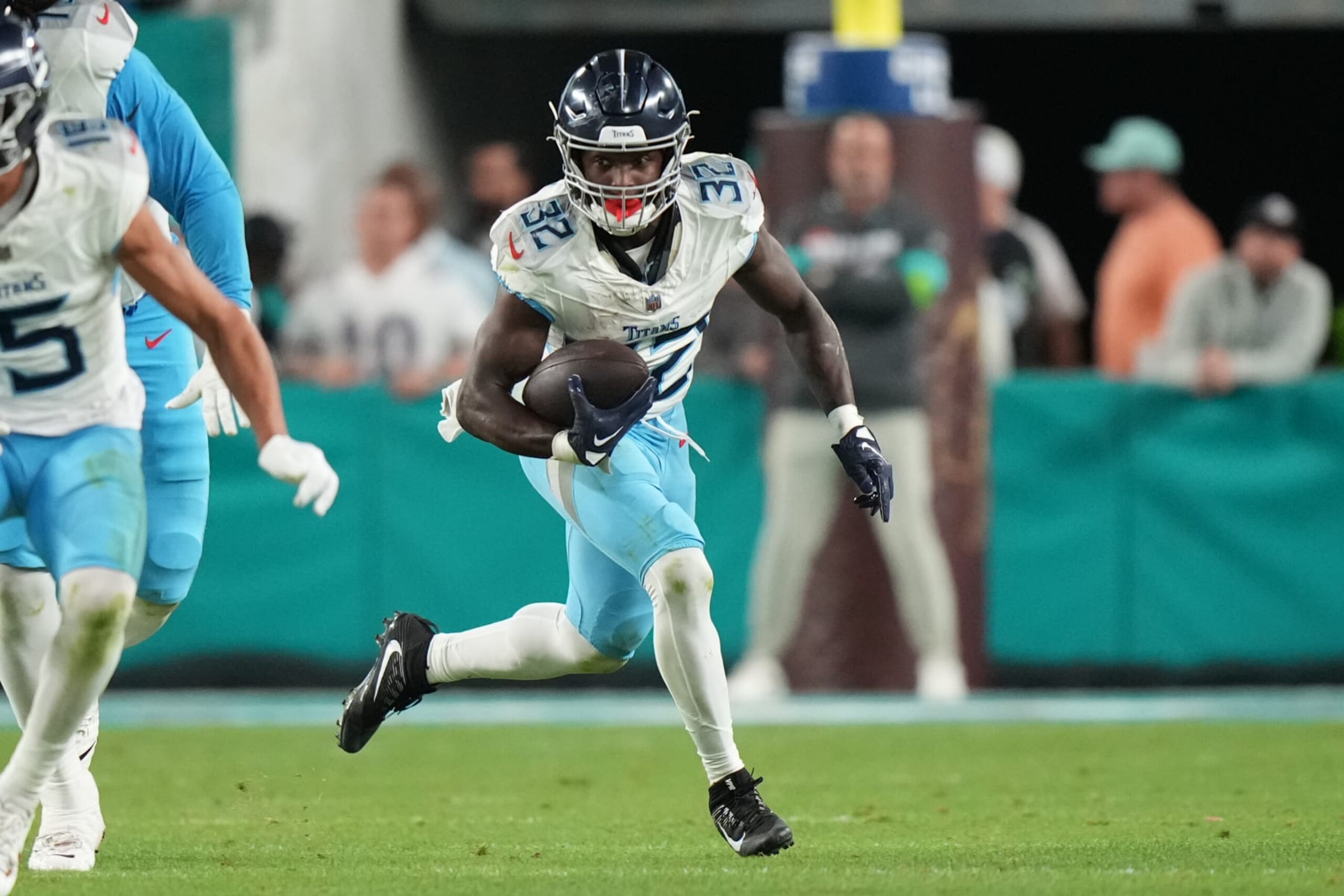 MIAMI GARDENS, FL - DECEMBER 11: Tennessee Titans running back Tyjae Spears (32) rushes with the ball during the game between the Tennessee Titans and Miami Dolphins on Monday, Dec. 11, 2023 at Hard Rock Stadium, Miami Gardens, Fla. (Photo by Peter Joneleit/Icon Sportswire via Getty Images)