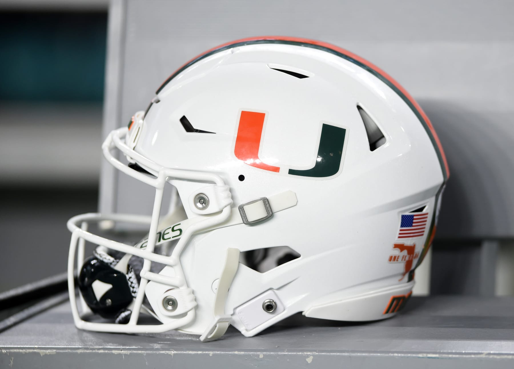 MIAMI GARDENS, FL - NOVEMBER 26: A Miami Hurricanes helmet sits on the bench during the college football game between the Pittsburgh Panthers and the Miami Hurricanes on November 26, 2022 at the Hard Rock Stadium in Miami Gardens, FL. (Photo by John Rivera/Icon Sportswire via Getty Images)
