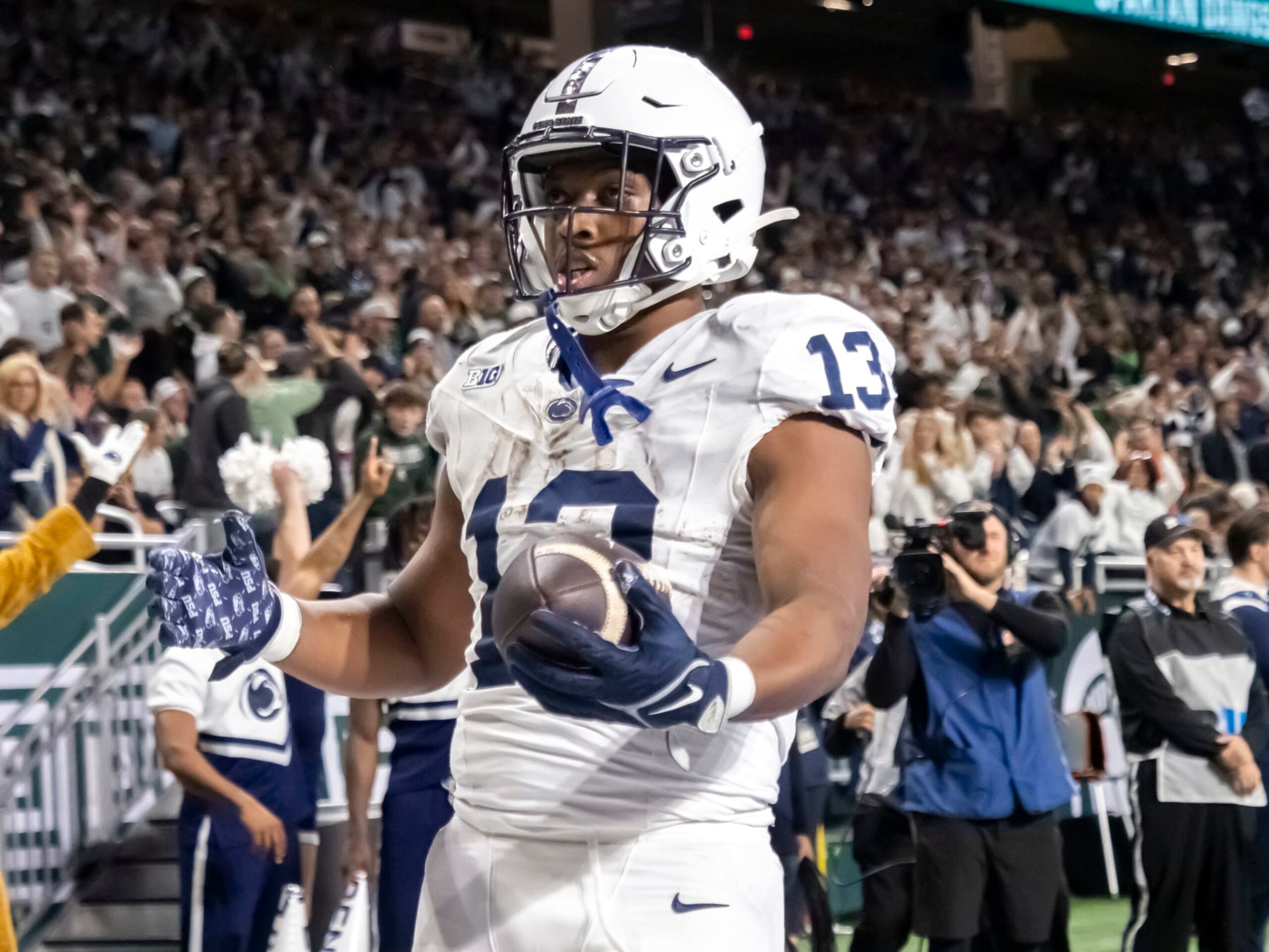 DETROIT, MI - NOVEMBER 24: Penn State Nittany Lions running back Kaytron Allen (13) catches the ball for a touchdown during a college football game between the Penn State Nittany Lions and the Michigan State Spartans on November 24, 2023 at Ford Field in Detroit, Michigan. (Photo by Joseph Weiser/Icon Sportswire via Getty Images)
