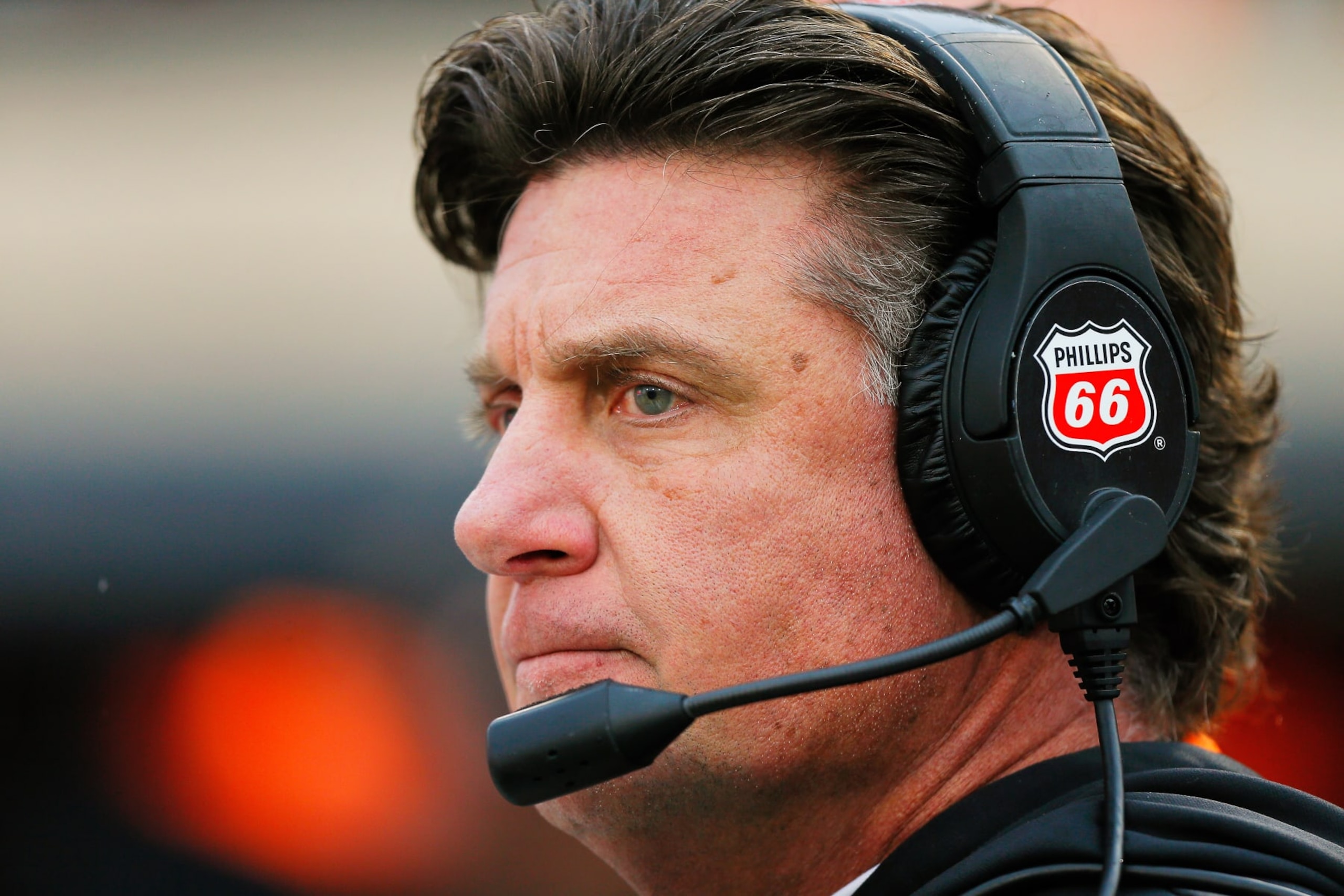 STILLWATER, OK - NOVEMBER 25:  Head coach Mike Gundy of the Oklahoma State Cowboys gets set for a game against the BYU Cougars at Boone Pickens Stadium on November 25, 2023 in Stillwater, Oklahoma.  Oklahoma State won 40-34 in double overtime.  (Photo by Brian Bahr/Getty Images)