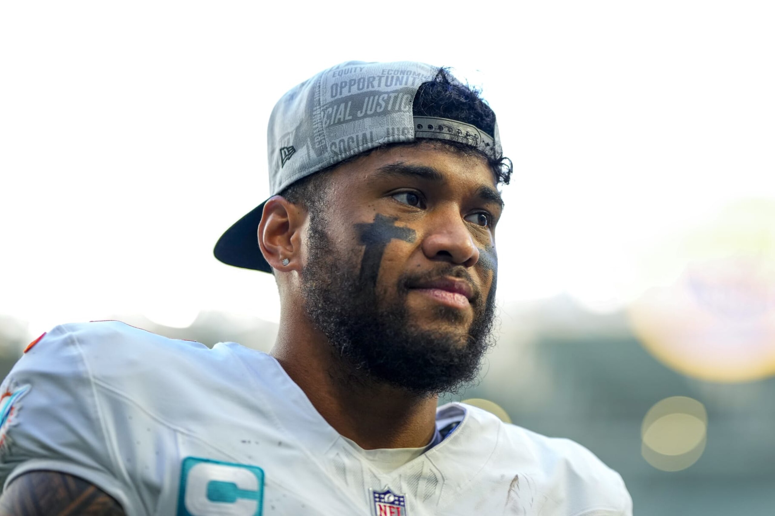 MIAMI GARDENS, FLORIDA - DECEMBER 17: Tua Tagovailoa #1 of the Miami Dolphins leaves the field after a game against the New York Jets at Hard Rock Stadium on December 17, 2023 in Miami Gardens, Florida. (Photo by Rich Storry/Getty Images) MIAMI GARDENS, FLORIDA - DECEMBER 17: Tua Tagovailoa #1 of the Miami Dolphins leaves the field after a game against the New York Jets at Hard Rock Stadium on December 17, 2023 in Miami Gardens, Florida. (Photo by Rich Storry/Getty Images)