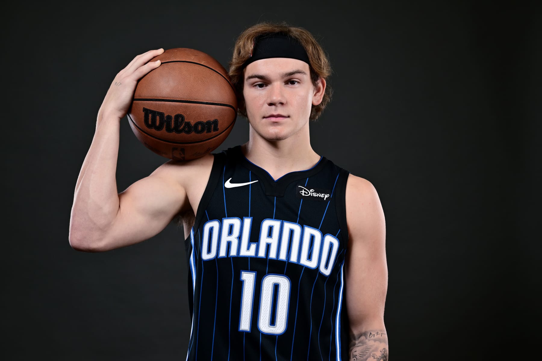 ORLANDO, FLORIDA - OCTOBER 02: Mac McClung #10 of the Orlando Magic poses for a portrait during the 2023-2024 Orlando Magic Media Day at AdventHealth Training Center on October 02, 2023 in Orlando, Florida. NOTE TO USER: User expressly acknowledges and agrees that, by downloading and/or using this Photograph, user is consenting to the terms and conditions of the Getty Images License Agreement. (Photo by Julio Aguilar/Getty Images)