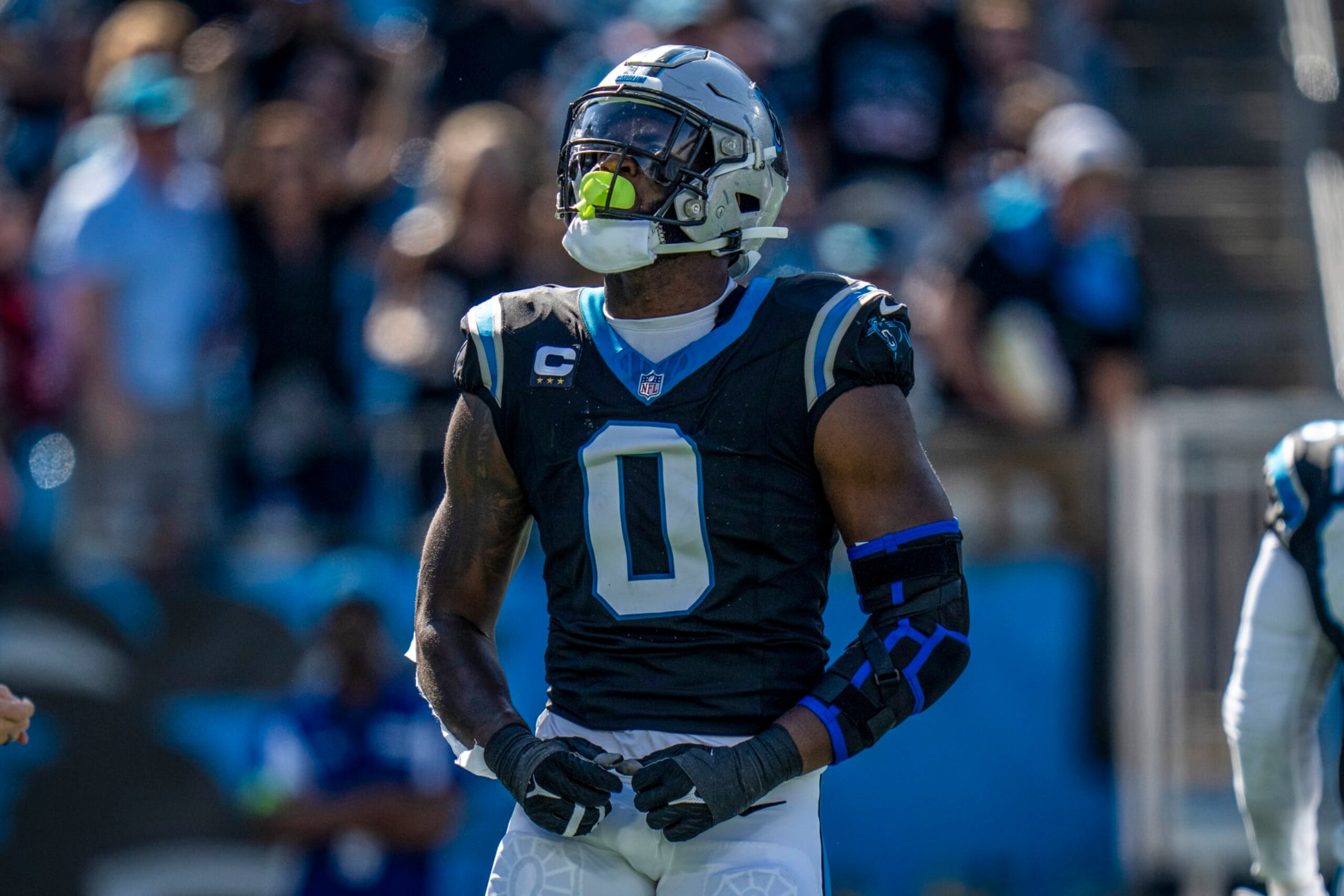 Carolina Panthers linebacker Brian Burns (0) celebrates a sack during an NFL football game against the Houston Texans on Sunday, Oct. 29, 2023, in Charlotte, N.C. (AP Photo/Rusty Jones)