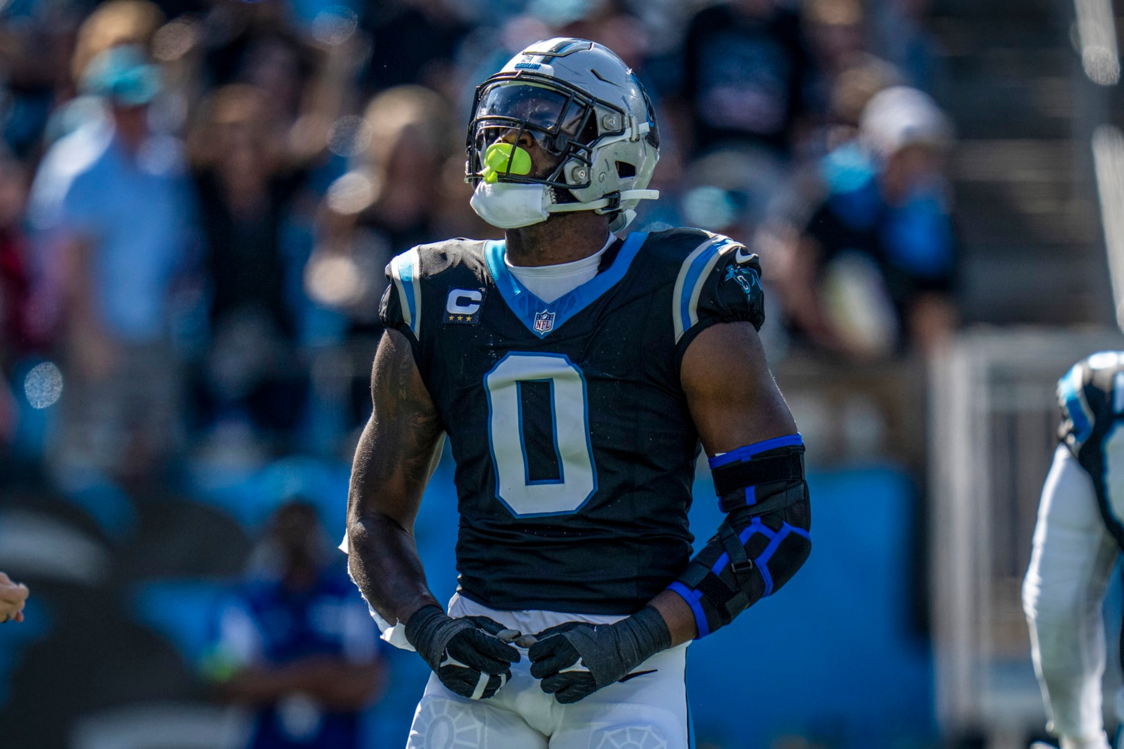 Carolina Panthers linebacker Brian Burns (0) celebrates a sack during an NFL football game against the Houston Texans on Sunday, Oct. 29, 2023, in Charlotte, N.C. (AP Photo/Rusty Jones)
