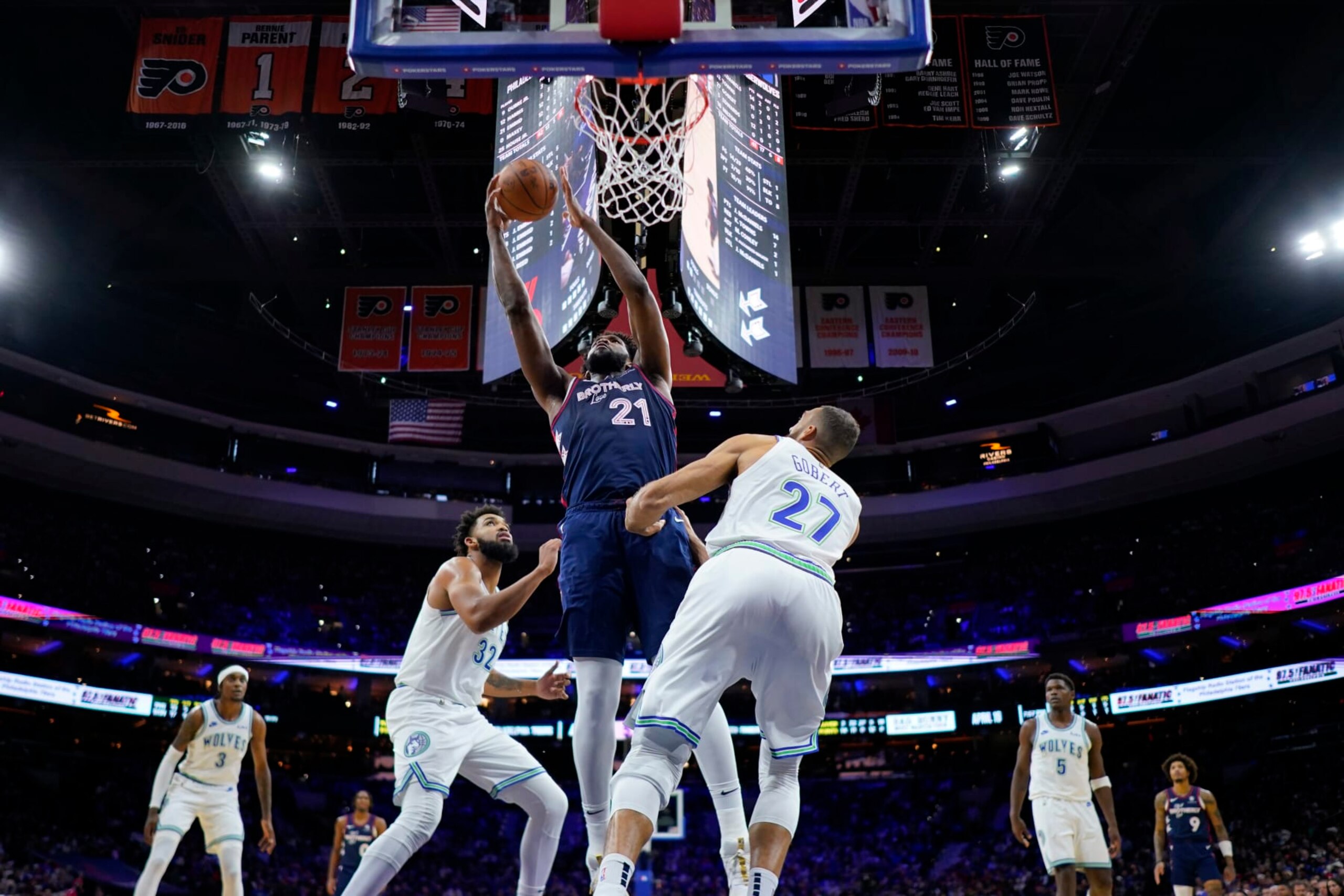 Philadelphia 76ers' Joel Embiid, center, goes up for a shot against Minnesota Timberwolves' Rudy Gobert, right, and Karl-Anthony Towns during the first half of an NBA basketball game, Wednesday, Dec. 20, 2023, in Philadelphia. (AP Photo/Matt Slocum) Philadelphia 76ers' Joel Embiid, center, goes up for a shot against Minnesota Timberwolves' Rudy Gobert, right, and Karl-Anthony Towns during the first half of an NBA basketball game, Wednesday, Dec. 20, 2023, in Philadelphia. (AP Photo/Matt Slocum)