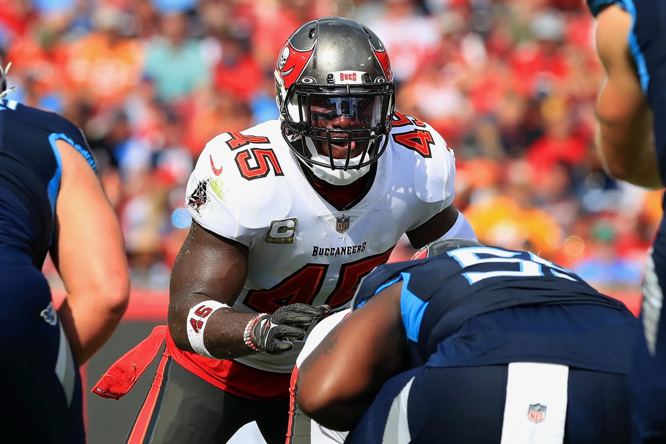 TAMPA, FL - NOVERMBER 12: Tampa Bay Buccaneers Linebacker Devin White (45) looks into the eyes of Tennessee Titans Quarterback Will Levis (8) during the regular season game between the Tennessee Titans and the Tampa Bay Buccaneers on November 12, 2023 at Raymond James Stadium in Tampa, Florida. (Photo by Cliff Welch/Icon Sportswire via Getty Images)