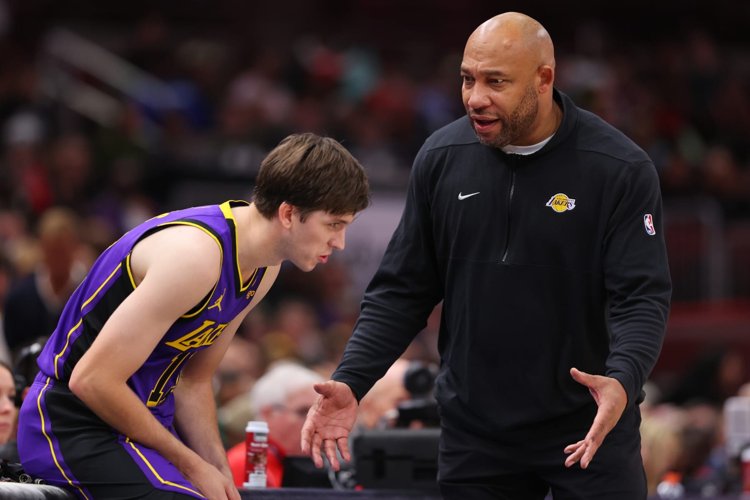 CHICAGO, ILLINOIS - DECEMBER 20: Head coach Darvin Ham of the Los Angeles Lakers talks with Austin Reaves #15 against the Chicago Bulls during the first half at the United Center on December 20, 2023 in Chicago, Illinois. NOTE TO USER: User expressly acknowledges and agrees that, by downloading and or using this photograph, User is consenting to the terms and conditions of the Getty Images License Agreement. (Photo by Michael Reaves/Getty Images) CHICAGO, ILLINOIS - DECEMBER 20: Head coach Darvin Ham of the Los Angeles Lakers talks with Austin Reaves #15 against the Chicago Bulls during the first half at the United Center on December 20, 2023 in Chicago, Illinois. NOTE TO USER: User expressly acknowledges and agrees that, by downloading and or using this photograph, User is consenting to the terms and conditions of the Getty Images License Agreement. (Photo by Michael Reaves/Getty Images)