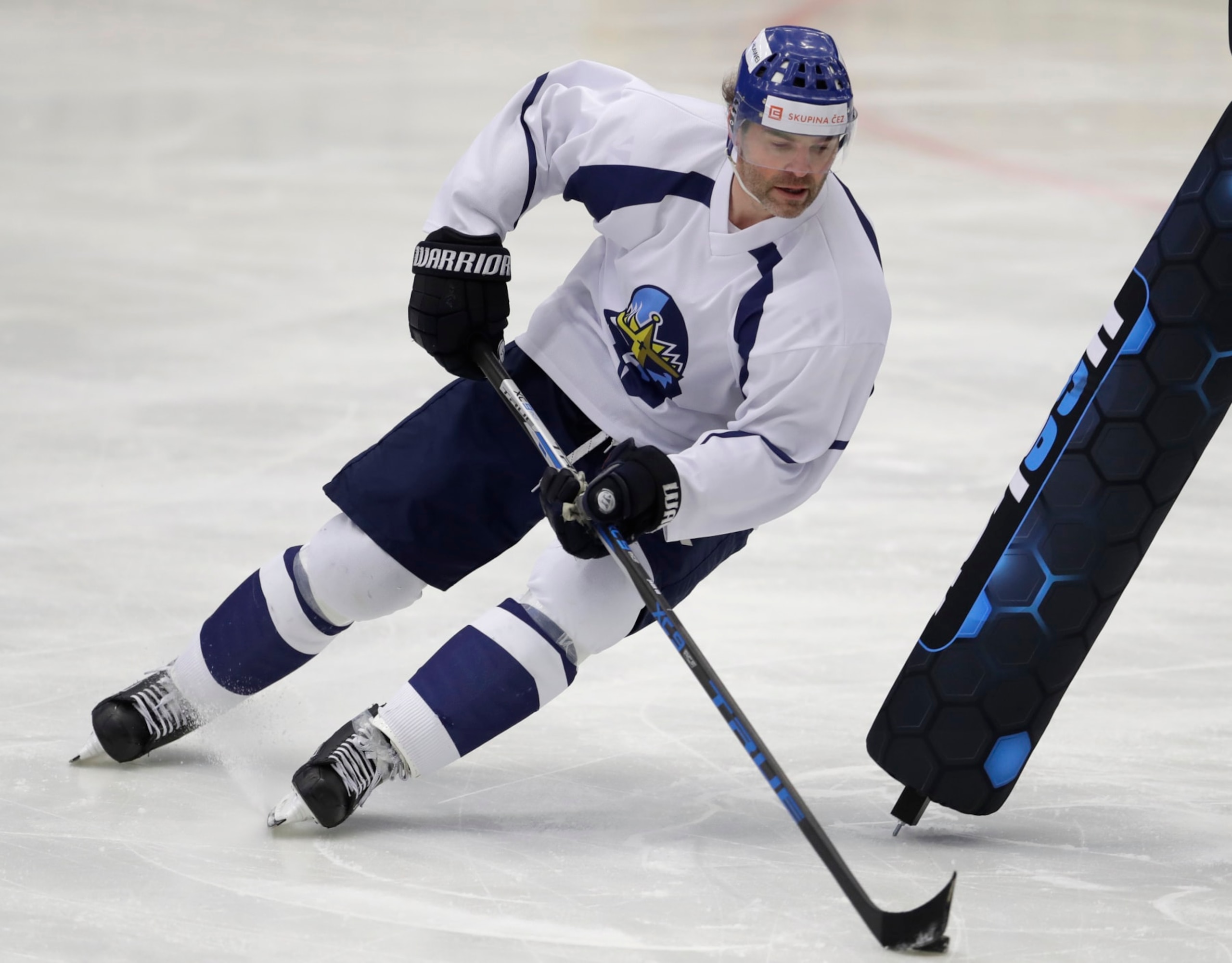 FILE-In this Thursday, Feb. 1, 2018, file photo, Jaromir Jagr during a practice session at the Kladno Knights hockey club in Kladno, Czech Republic. Jaromir Jagr is ageless. On Thursday April 29, 2021, the 49-year-old had an assist on the way to his Kladno Knights's 5-2 victory over Jihlava to clinch their playoff series 4-3 and qualify for the top Czech league in next season. (AP Photo/Petr David Josek/ File)