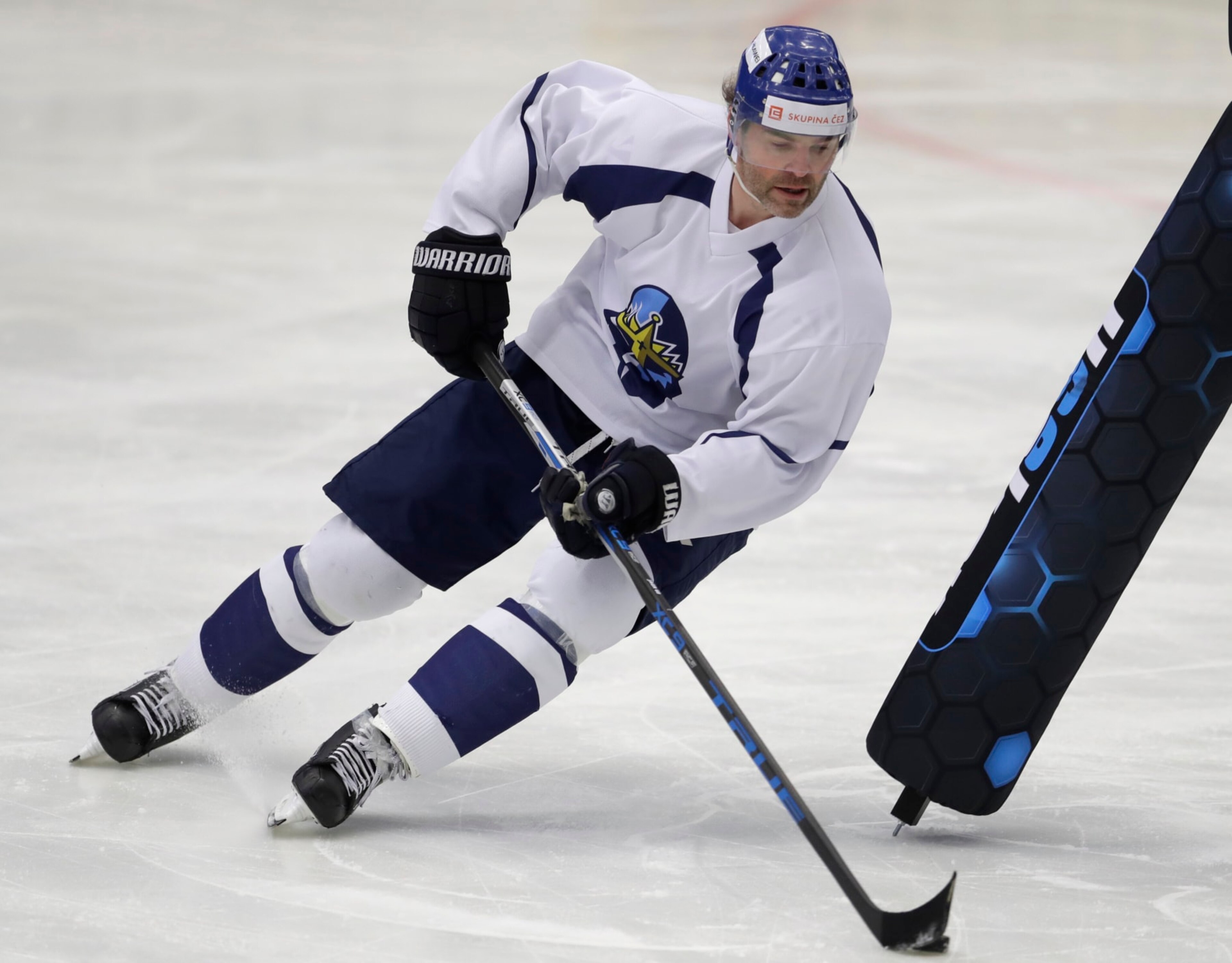 FILE-In this Thursday, Feb. 1, 2018, file photo, Jaromir Jagr during a practice session at the Kladno Knights hockey club in Kladno, Czech Republic. Jaromir Jagr is ageless. On Thursday April 29, 2021, the 49-year-old had an assist on the way to his Kladno Knights's 5-2 victory over Jihlava to clinch their playoff series 4-3 and qualify for the top Czech league in next season. (AP Photo/Petr David Josek/ File)