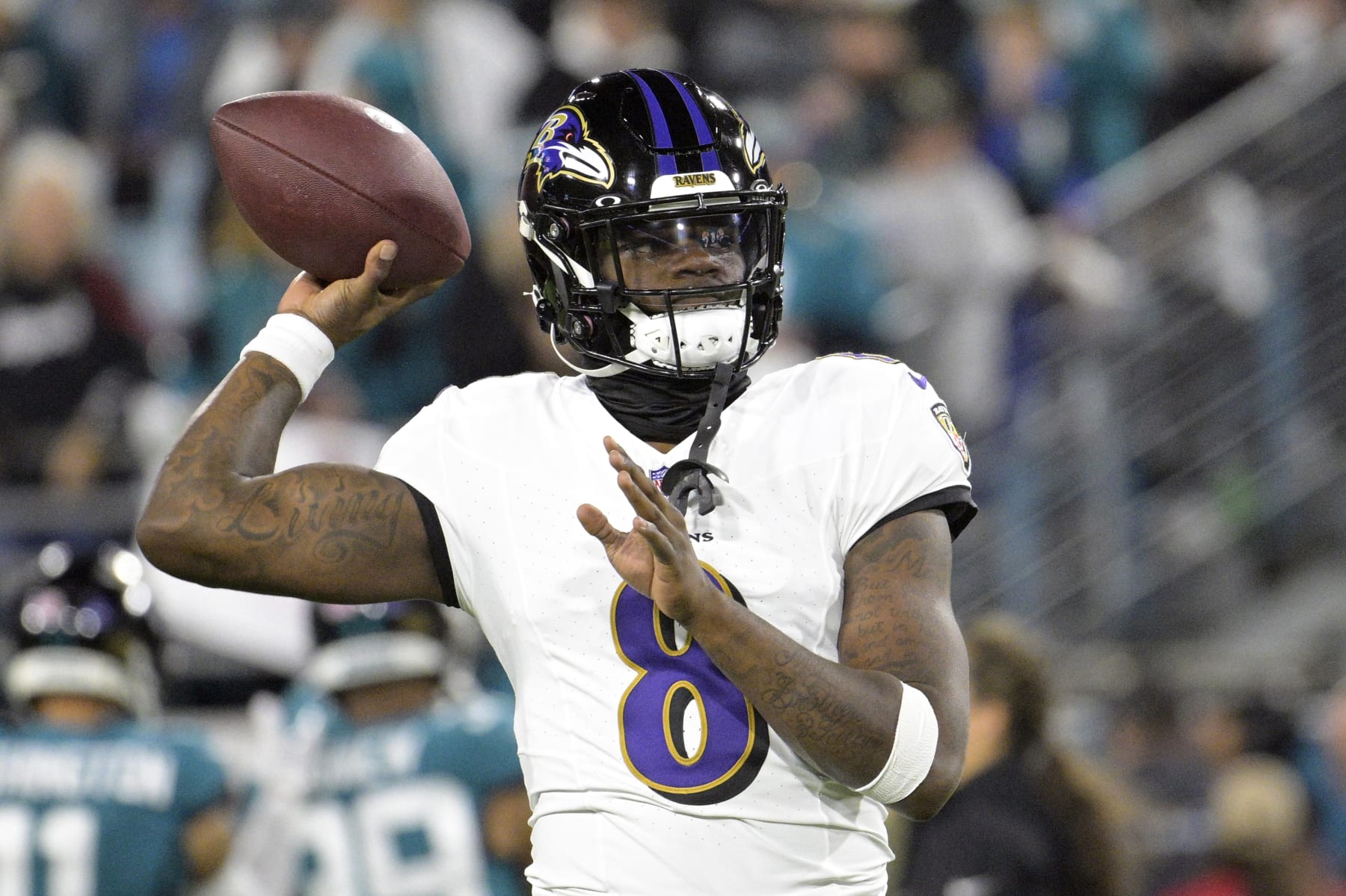 Baltimore Ravens quarterback Lamar Jackson warms up before an NFL football game against the Jacksonville Jaguars Sunday, Dec. 17, 2023, in Jacksonville, Fla. (AP Photo/Phelan M. Ebenhack)