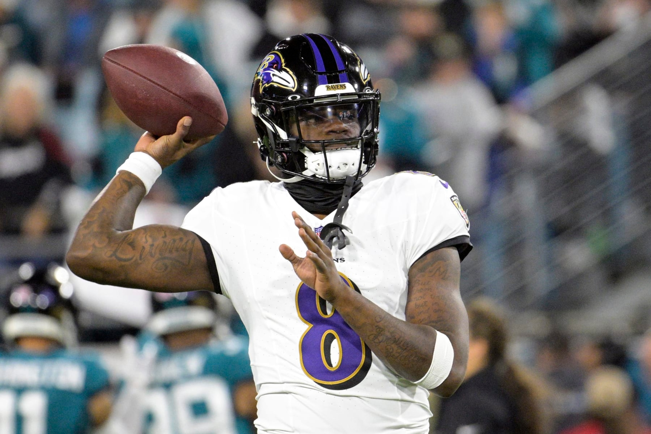 Baltimore Ravens quarterback Lamar Jackson warms up before an NFL football game against the Jacksonville Jaguars Sunday, Dec. 17, 2023, in Jacksonville, Fla. (AP Photo/Phelan M. Ebenhack)