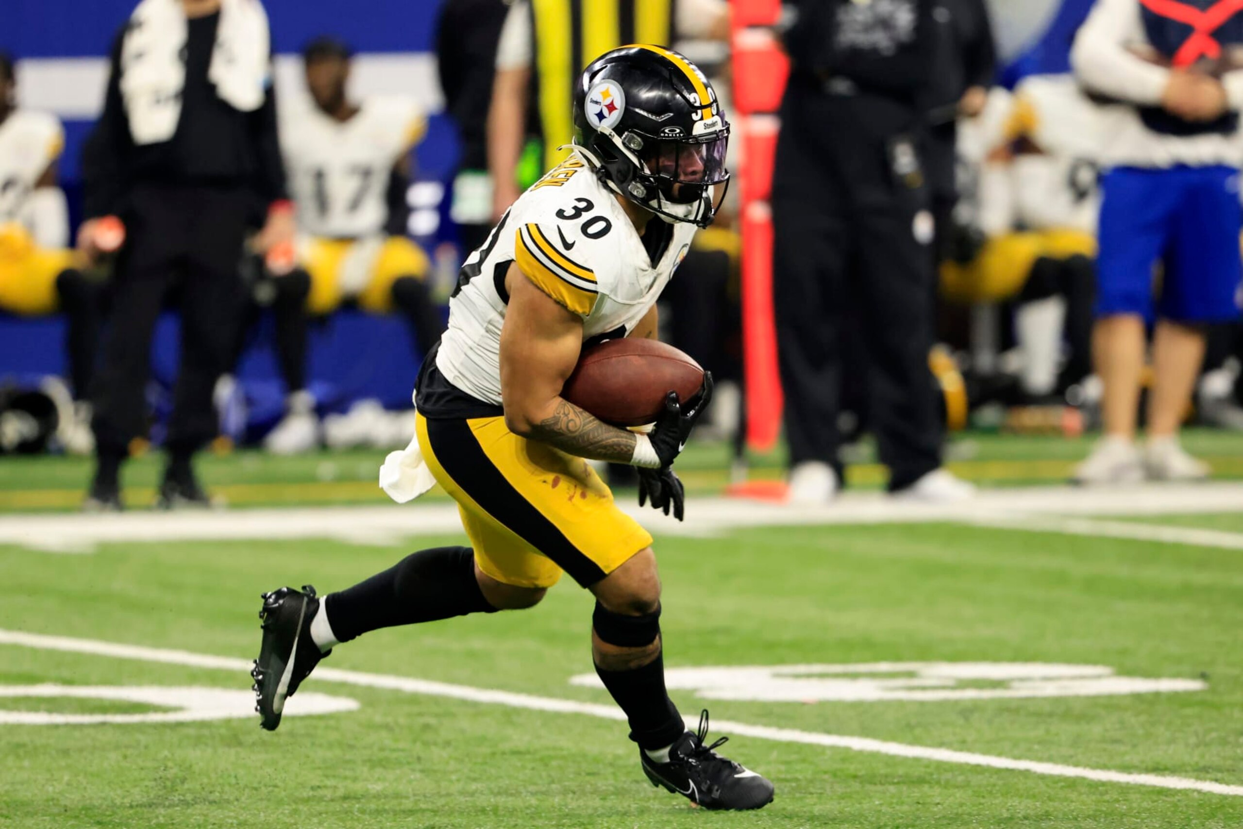INDIANAPOLIS, INDIANA - DECEMBER 16: Jaylen Warren #30 of the Pittsburgh Steelers runs the ball in the game against the Indianapolis Colts at Lucas Oil Stadium on December 16, 2023 in Indianapolis, Indiana. (Photo by Justin Casterline/Getty Images)