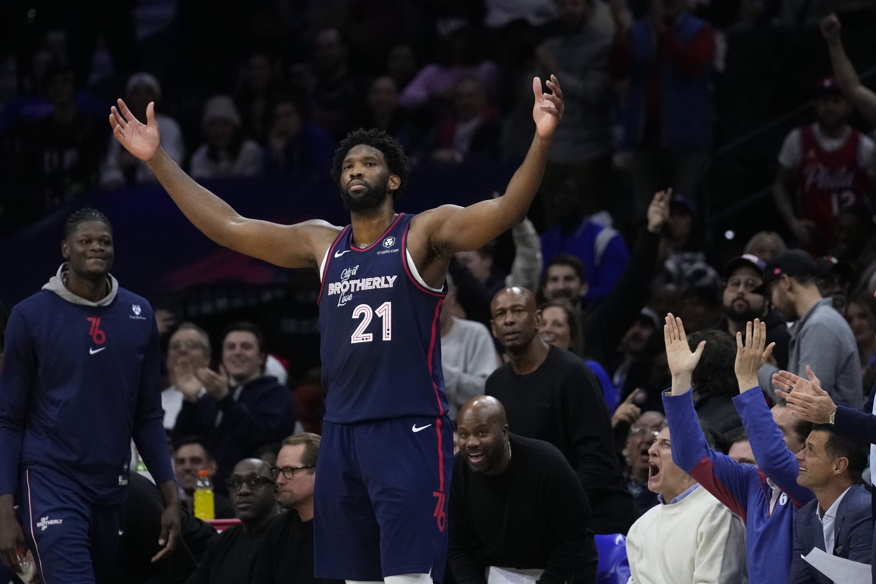 Philadelphia 76ers' Joel Embiid reacts during the second half of an NBA basketball game against the Minnesota Timberwolves, Wednesday, Dec. 20, 2023, in Philadelphia. (AP Photo/Matt Slocum)