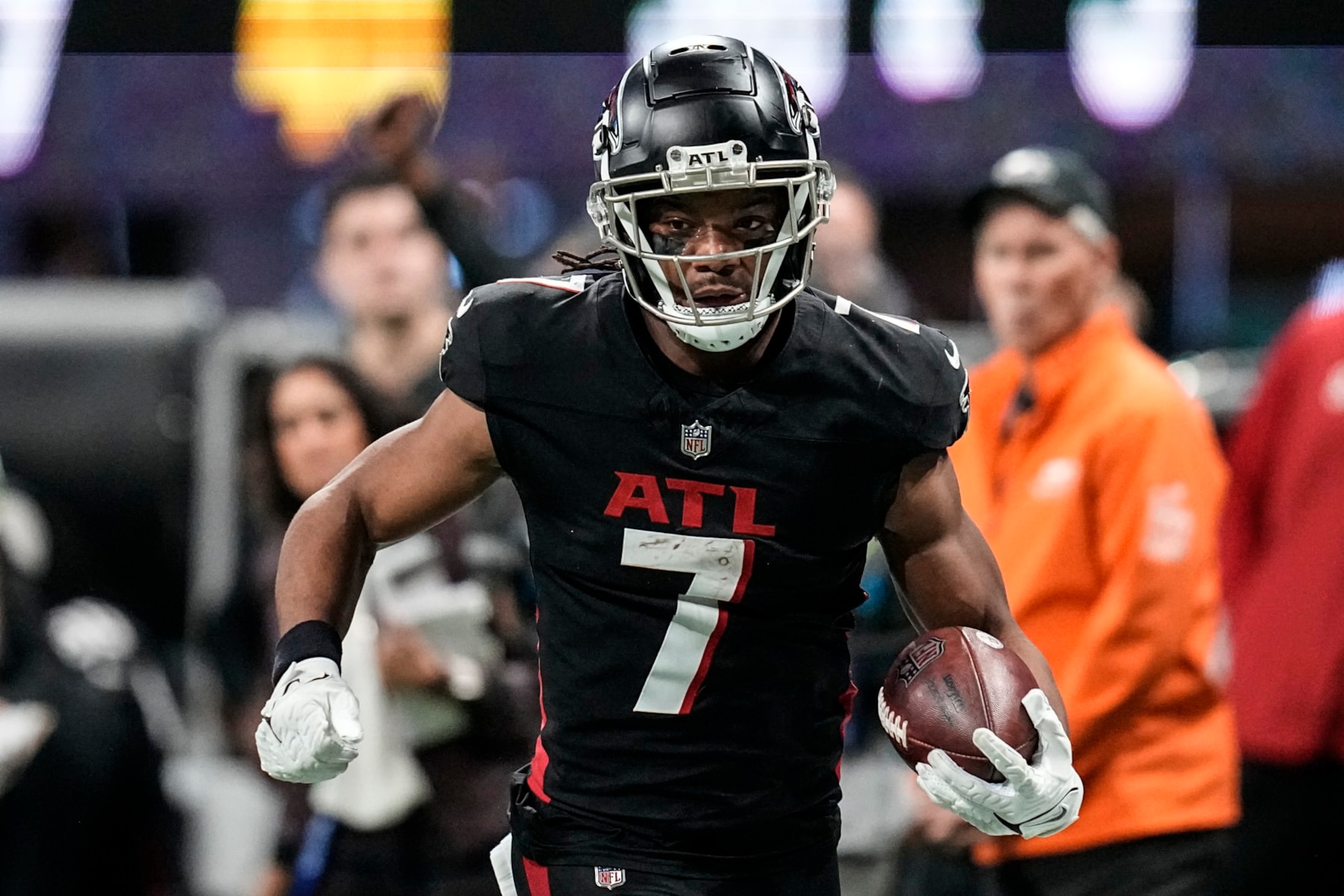 Atlanta Falcons running back Bijan Robinson (7) runs against the Tampa Bay Buccaneers during the second half of an NFL football game, Sunday, Dec. 10, 2023, in Atlanta. (AP Photo/Mike Stewart) Atlanta Falcons running back Bijan Robinson (7) runs against the Tampa Bay Buccaneers during the second half of an NFL football game, Sunday, Dec. 10, 2023, in Atlanta. (AP Photo/Mike Stewart)