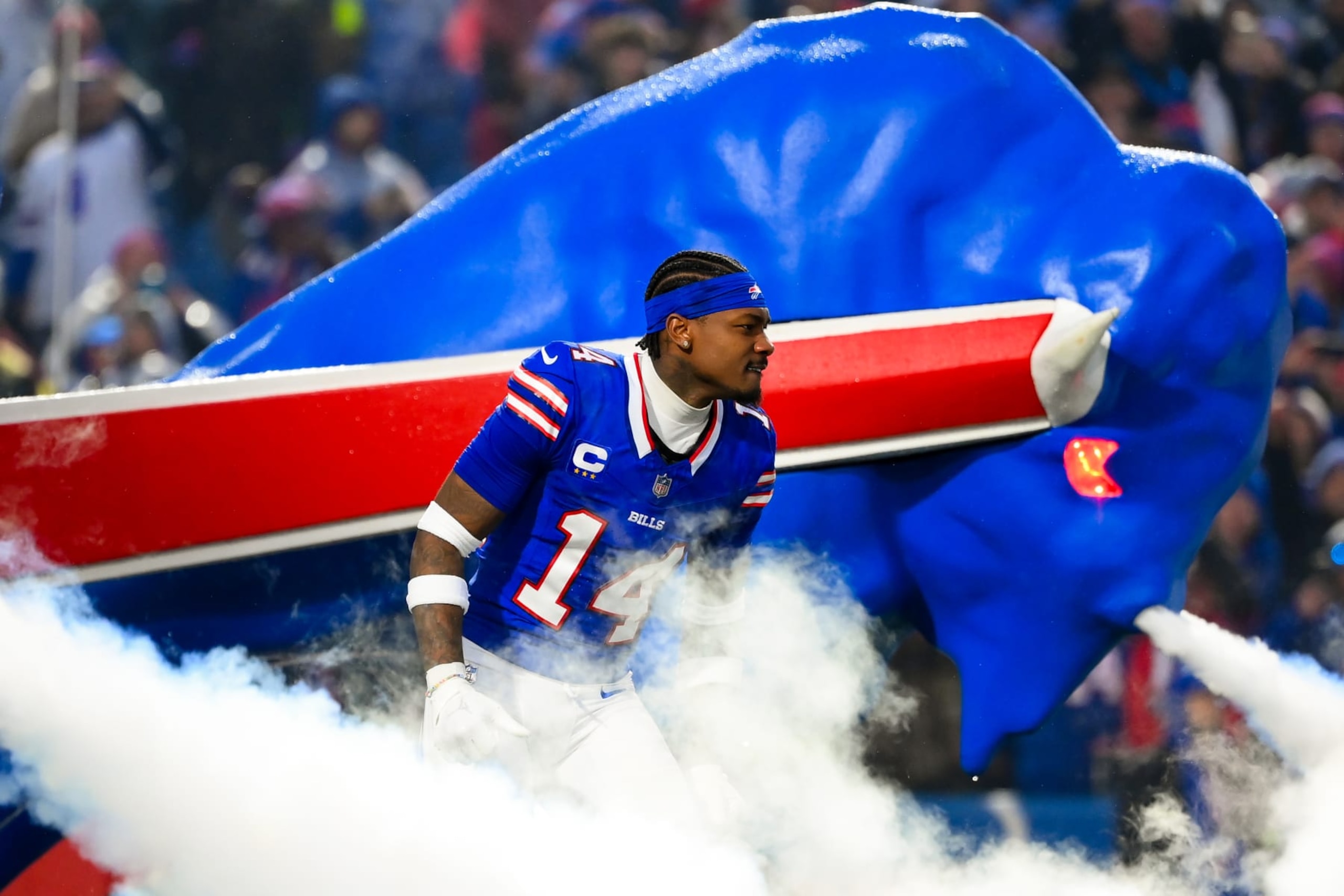 ORCHARD PARK, NEW YORK - DECEMBER 17: Stefon Diggs #14 of the Buffalo Bills jogs on the field during player introductions prior to the game against the Dallas Cowboys at Highmark Stadium on December 17, 2023 in Orchard Park, New York. The Bills won 31-10. (Photo by Rich Barnes/Getty Images)