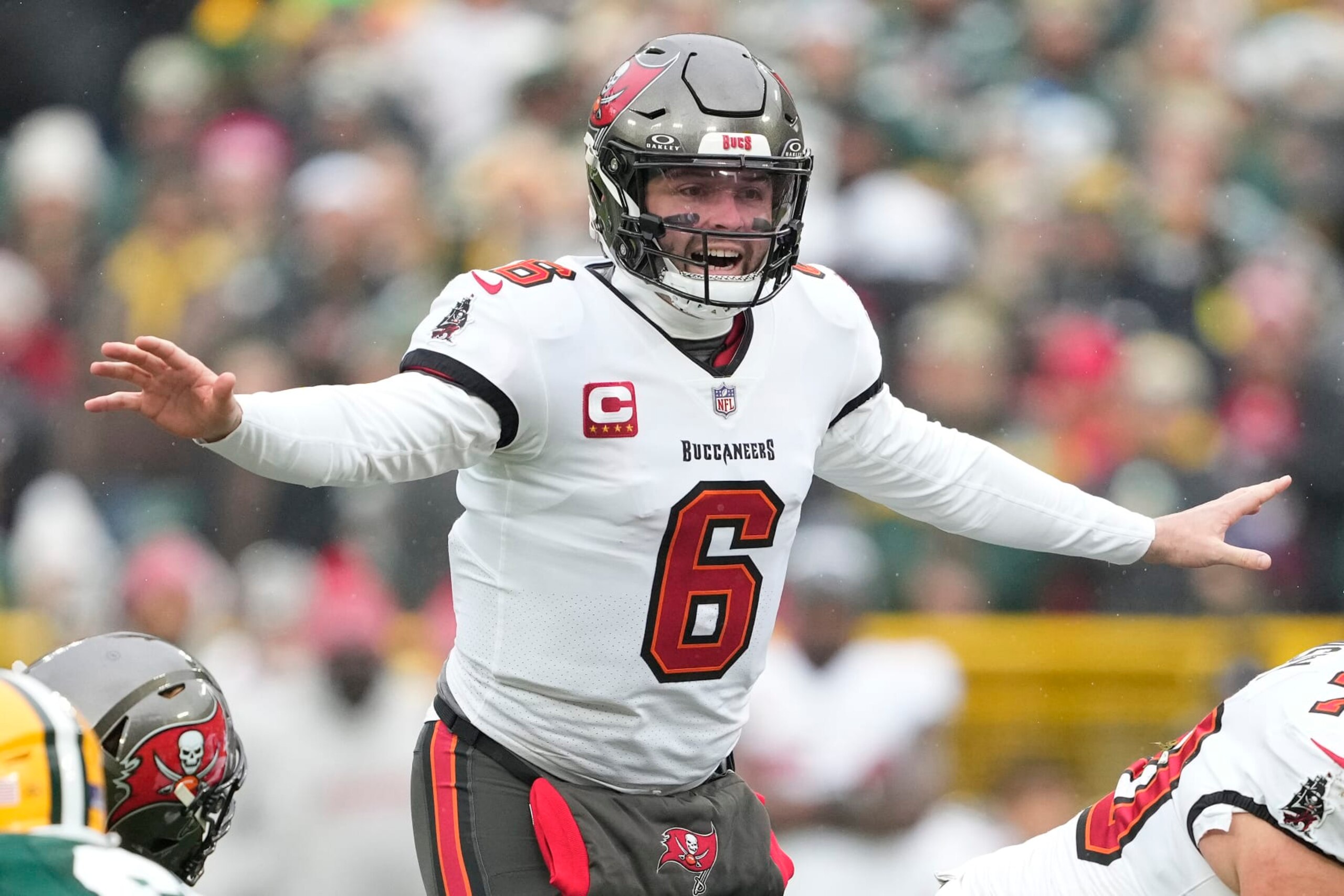 GREEN BAY, WISCONSIN - DECEMBER 17: Baker Mayfield #6 of the Tampa Bay Buccaneers signals at the line of scrimmage during the first half against the Green Bay Packers at Lambeau Field on December 17, 2023 in Green Bay, Wisconsin. (Photo by Patrick McDermott/Getty Images)