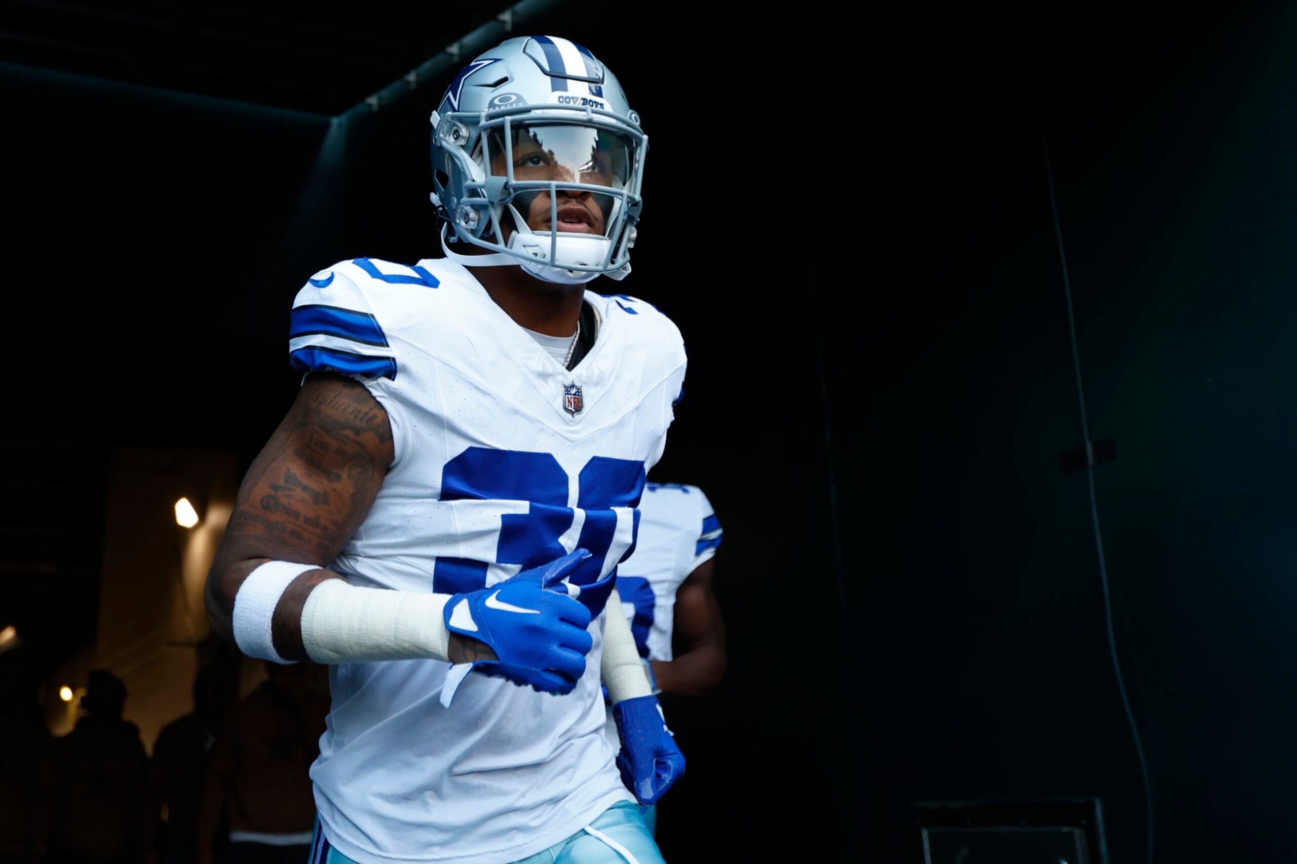 Dallas Cowboys safety Juanyeh Thomas (30) runs onto the field before an NFL football game against the Philadelphia Eagles, Sunday, Nov. 5, 2023, in Philadelphia. (AP Photo/Rich Schultz)